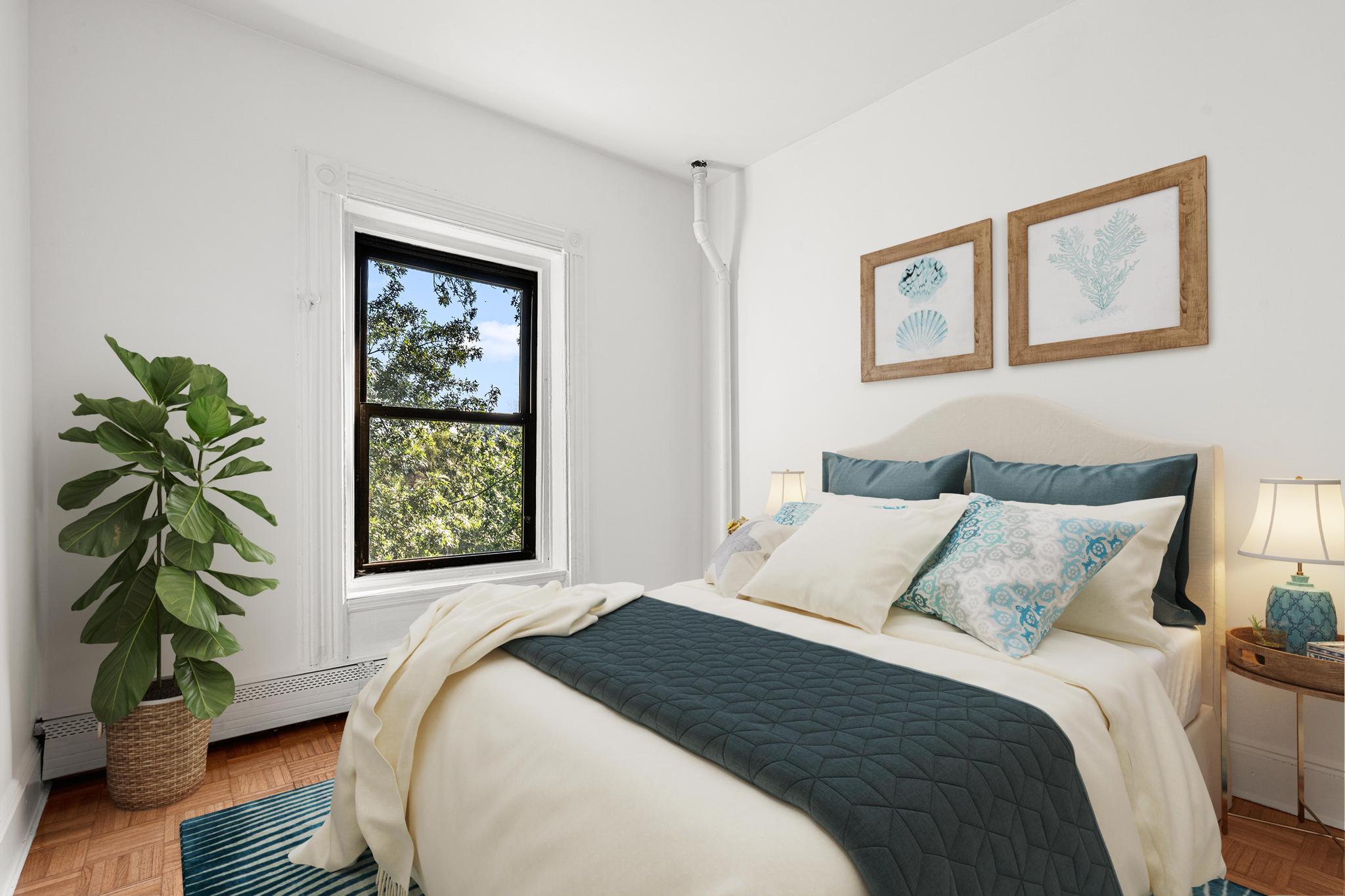 306 Lafayette Avenue, Unit 4 Brooklyn, NY 11238 - Photo 7 of 11 a bedroom with bed and a window