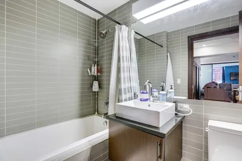 a reading room with furniture and book shelf