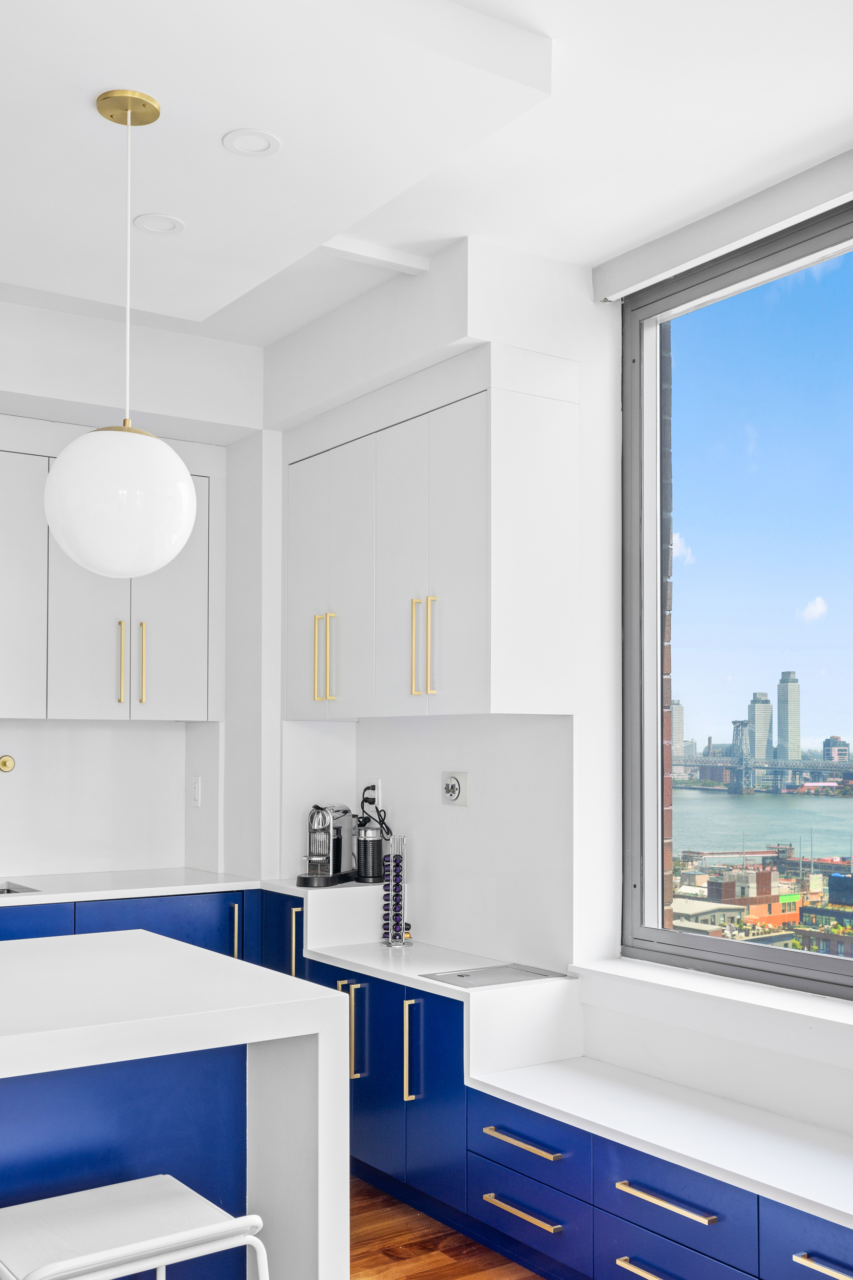 100 Jay Street, Unit 20F Brooklyn, NY 11201 - Photo 7 of 20 a living room with furniture and a potted plant