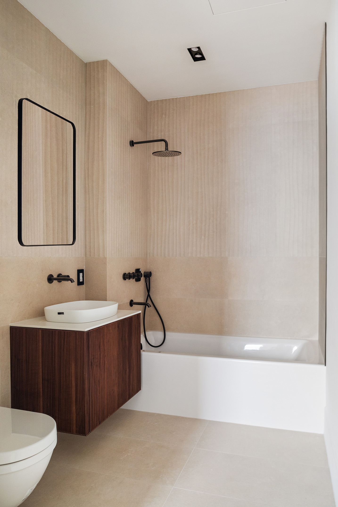 28 Herbert Street, Unit 4B Brooklyn, NY 11222 - Photo 6 of 14 a bathroom with a sink a toilet and bathtub