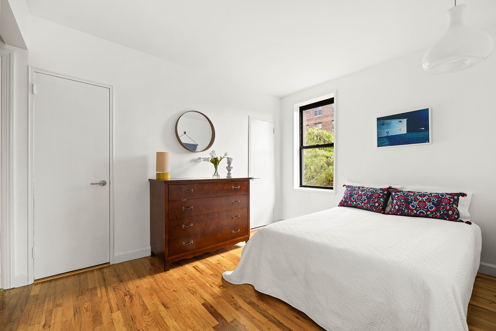 100 Ocean Parkway, Unit 3H Brooklyn, NY 11218 - Photo 7 of 11 a bedroom with a bed and a window