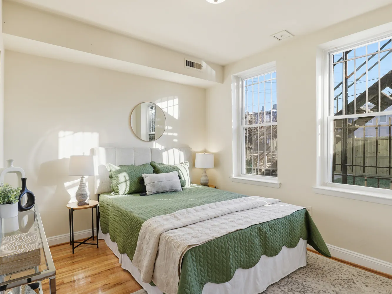 a bedroom with a bed and window