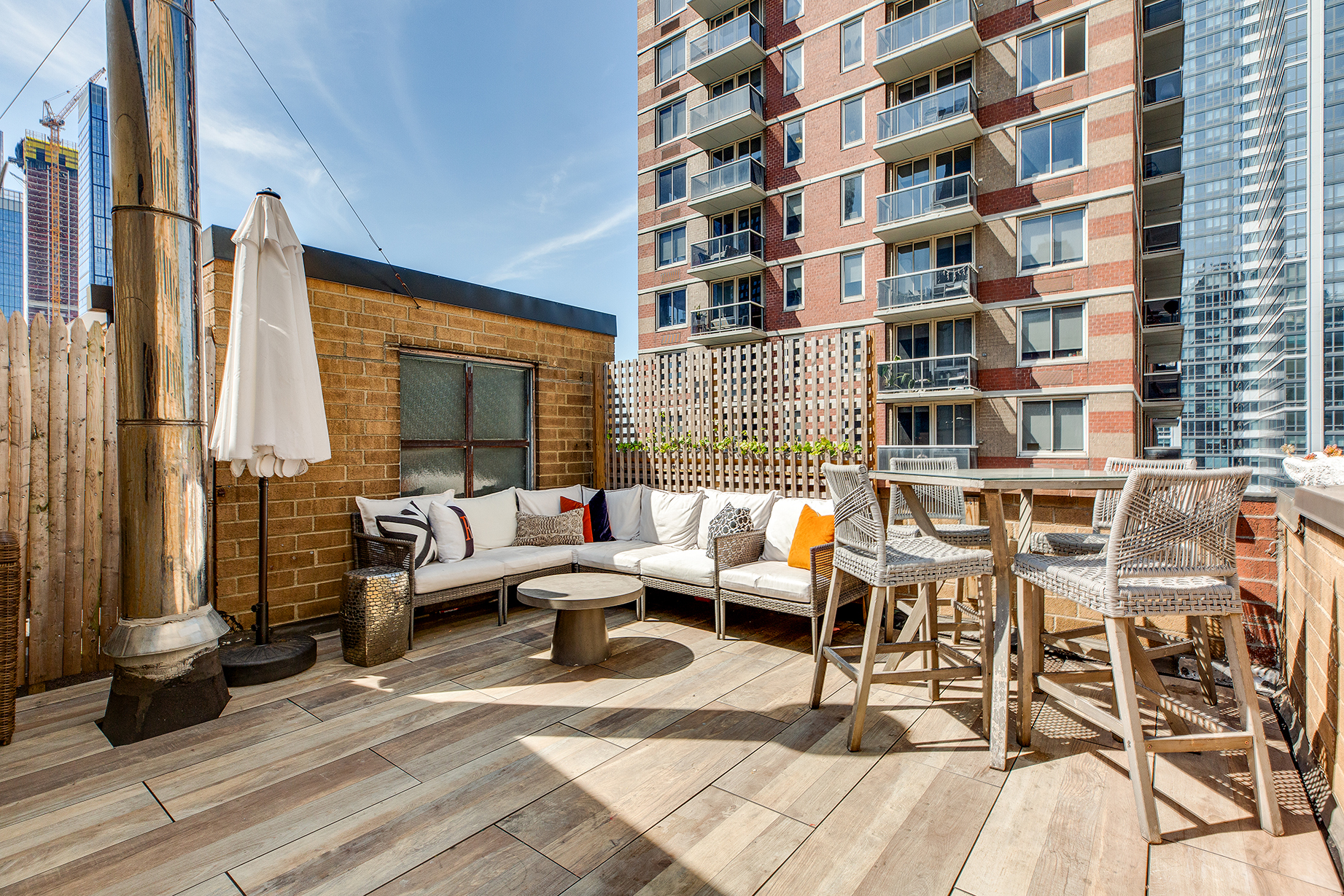 529 West 42nd Street, Unit 9R Manhattan, NY 10036 - Photo 8 of 10 a building outdoor space with patio furniture