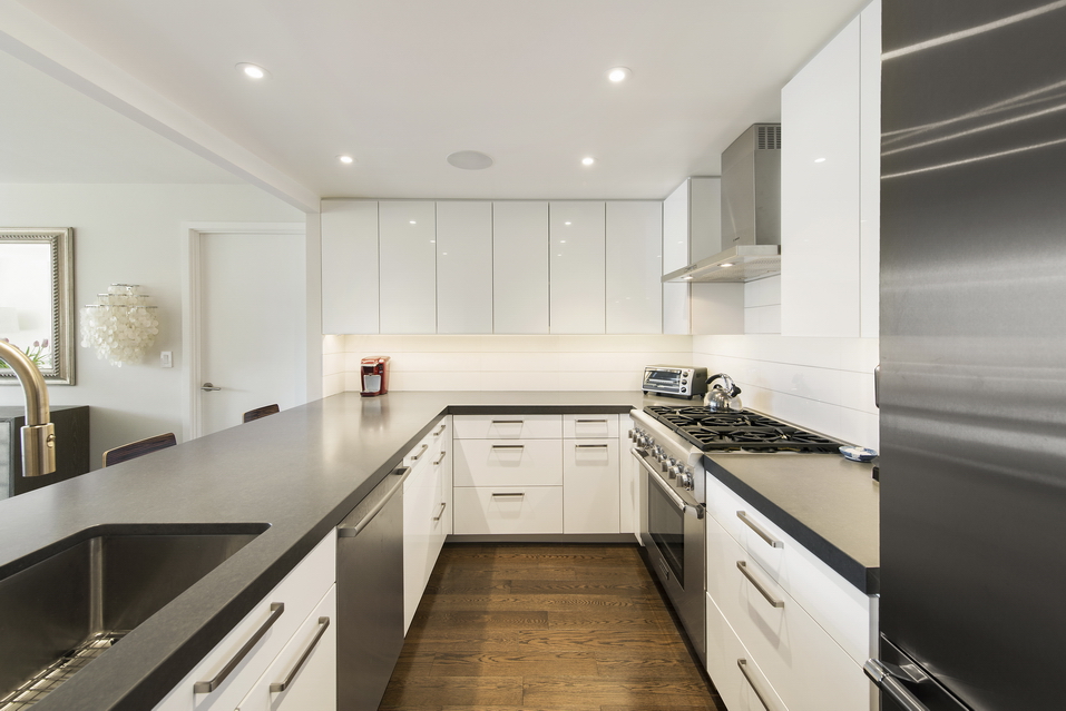225 West 83rd Street, Unit 10K Manhattan, NY 10024 - Photo 5 of 21 a kitchen with a sink stove and refrigerator