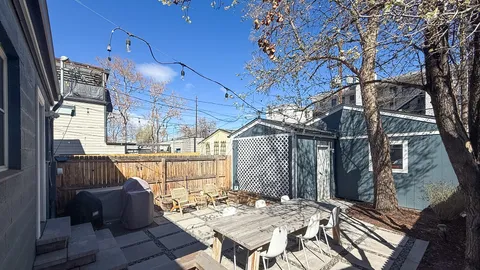 a view of a backyard of the house