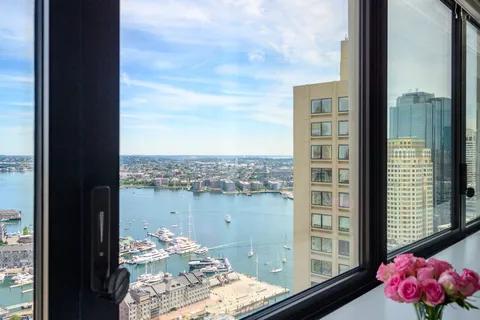 a view of a balcony with an ocean view