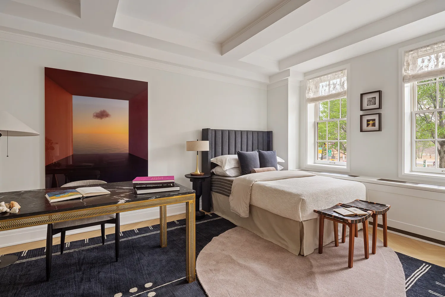 a bedroom with a bed and a desk