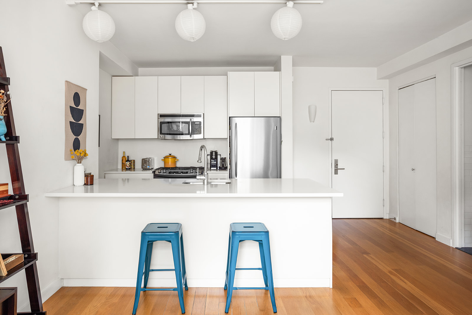 189 Schermerhorn Street, Unit 16G Brooklyn, NY 11201 - Photo 4 of 15 a kitchen with stainless steel appliances a refrigerator and a stove