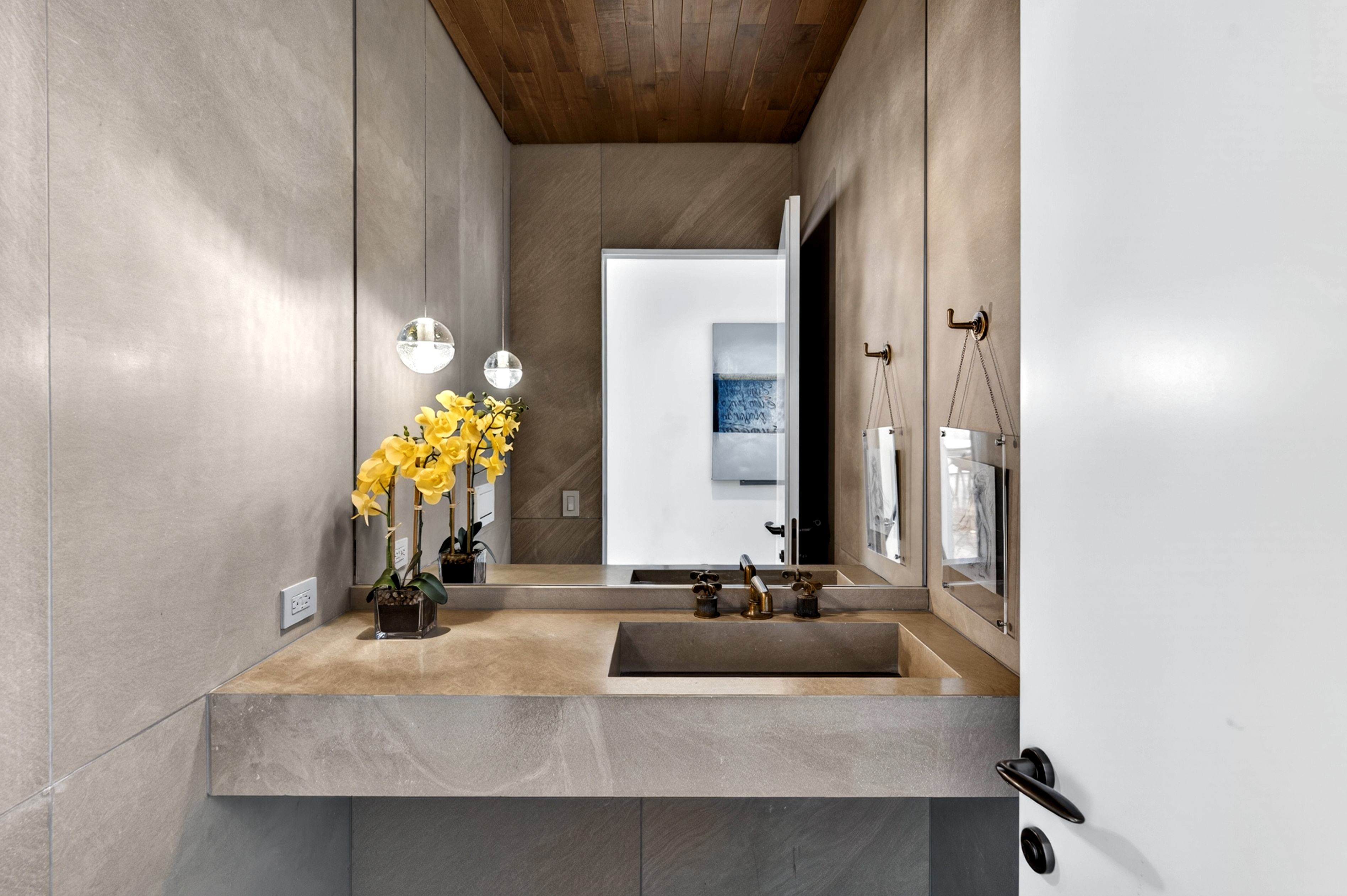 527 West 27th Street, Unit 6S Manhattan, NY 10001 - Photo 15 of 19 a bathroom with a sink and a mirror