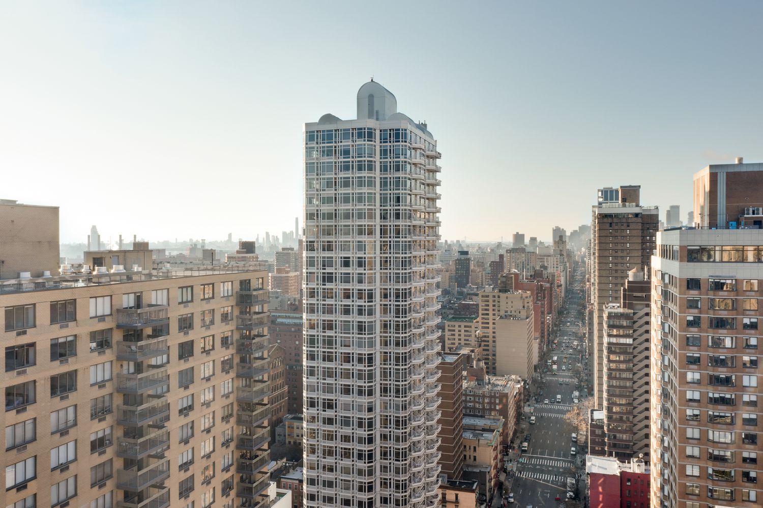 a view of a city with tall buildings