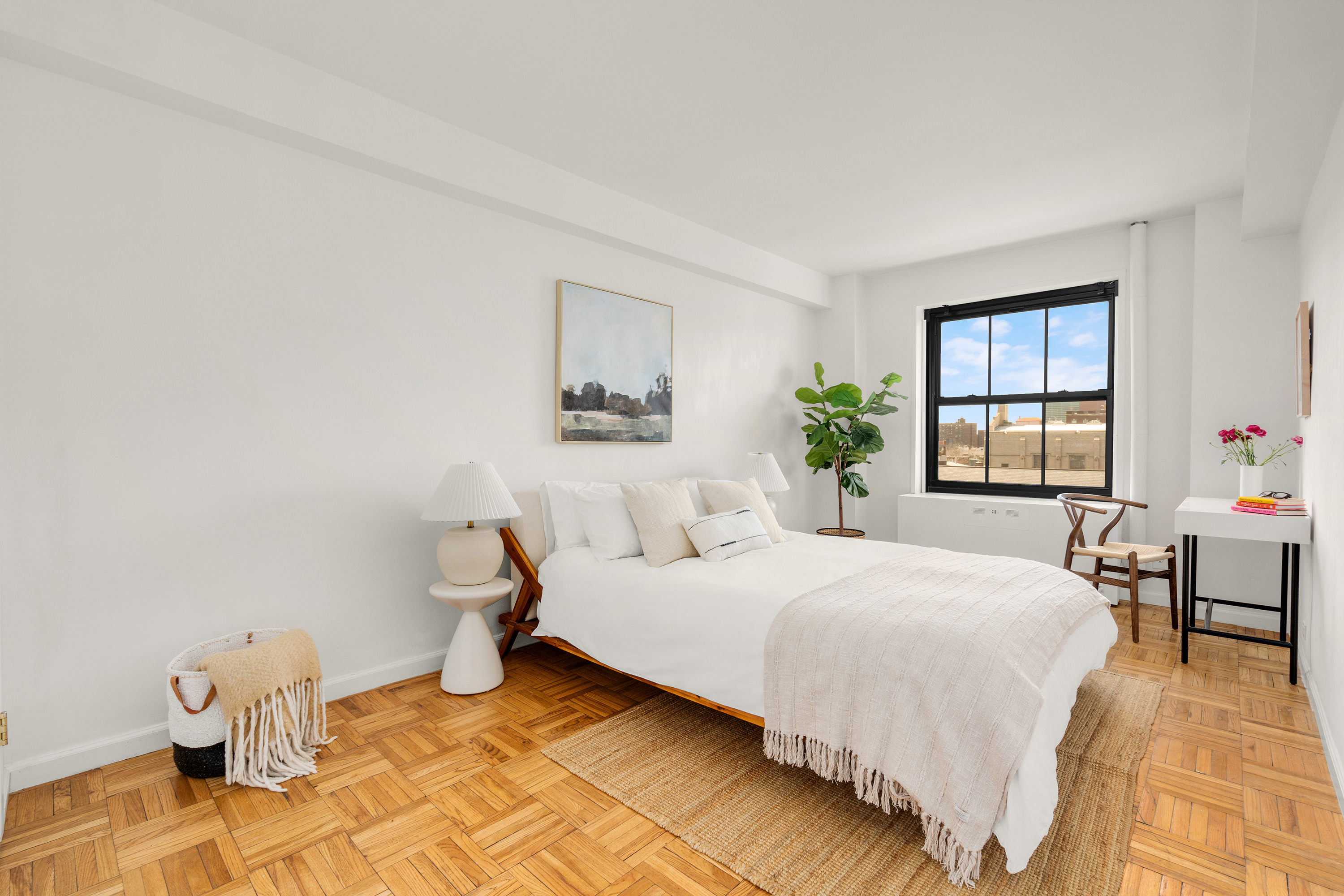 361 Clinton Avenue, Unit 7D Brooklyn, NY 11238 - Photo 6 of 10 a bedroom with a bed and a table