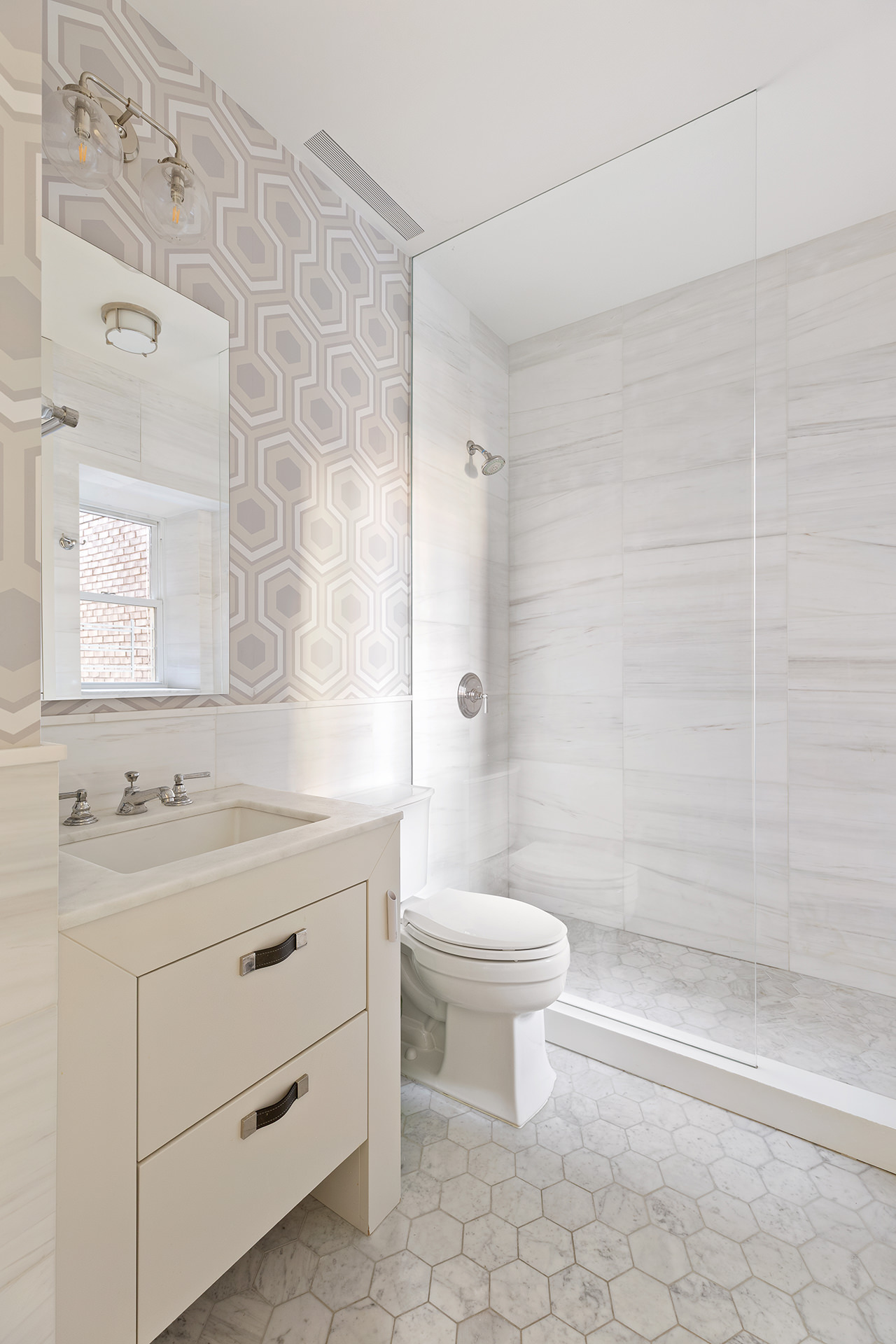 100 West 80th Street, Unit 5B Manhattan, NY 10024 - Photo 15 of 19 a bathroom with a sink a toilet and shower