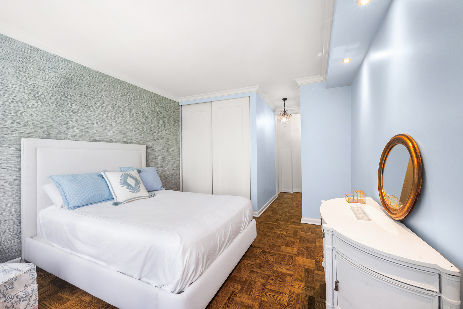 311 East 71st Street, Unit 2B Manhattan, NY 10021 - Photo 7 of 10 a bedroom with bed and a large window