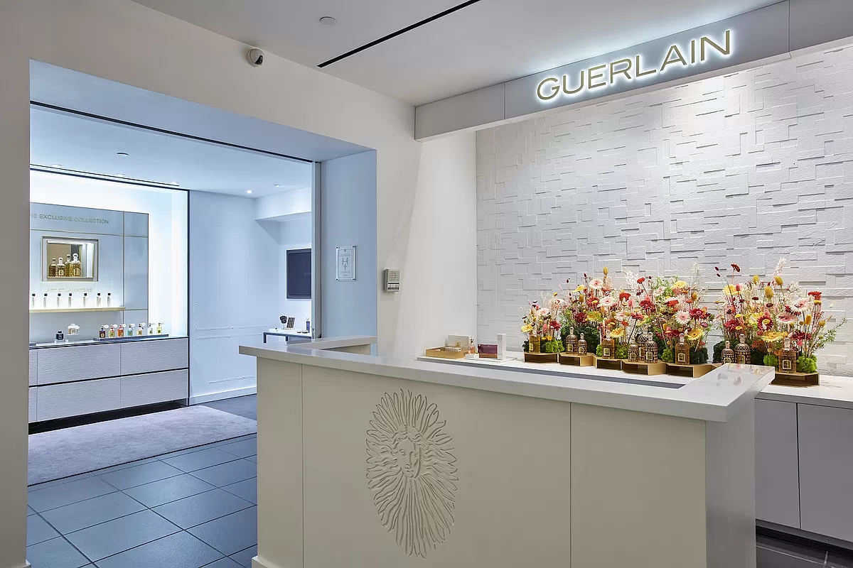 768 5th Avenue, Unit 1237 Manhattan, NY 10019 - Photo 7 of 8 a kitchen with stainless steel appliances a sink and a stove