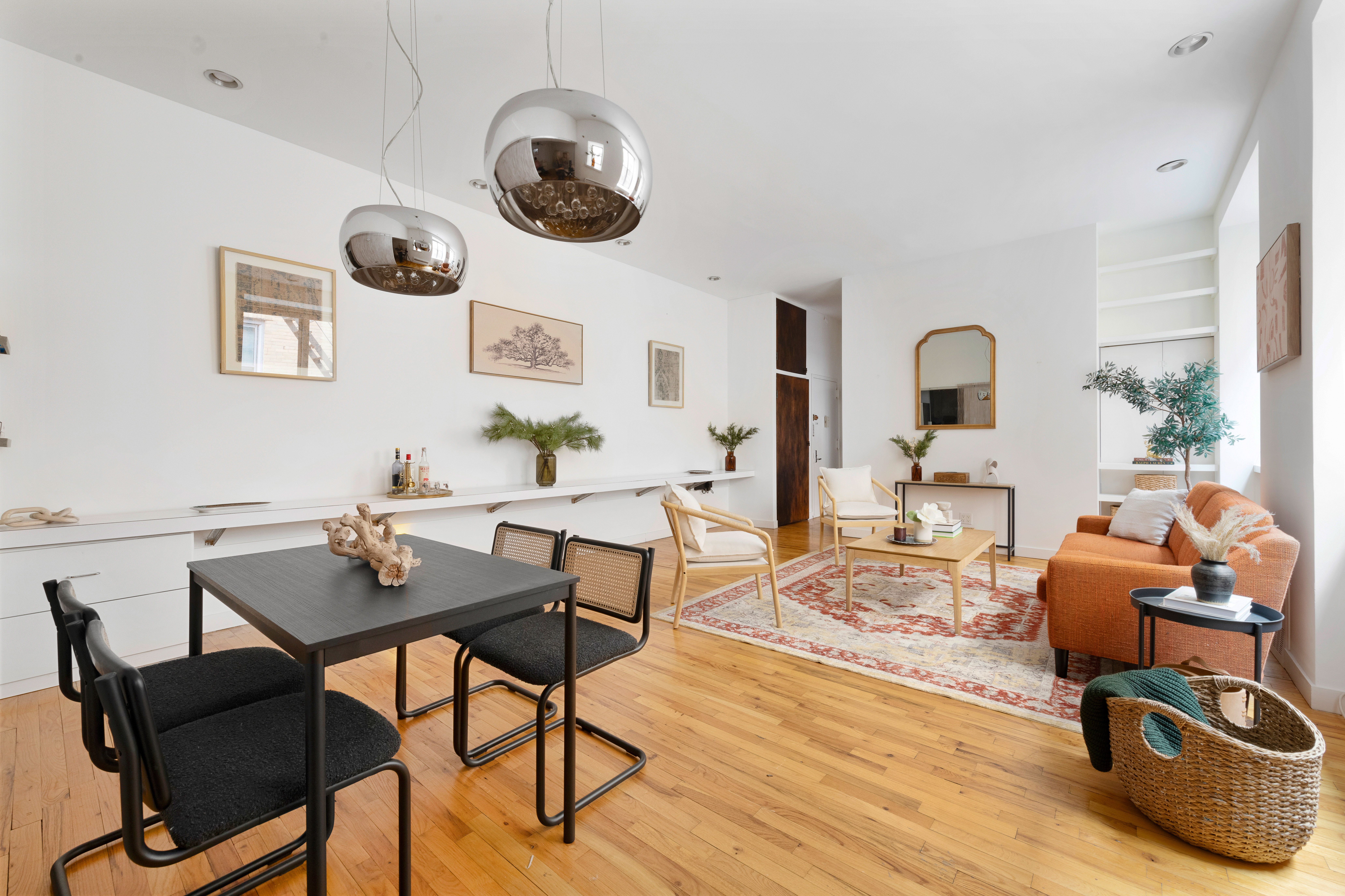 689 Fort Washington Avenue, Unit M2 Manhattan, NY 10040 - Photo 4 of 9 a living room with furniture kitchen view and a large window