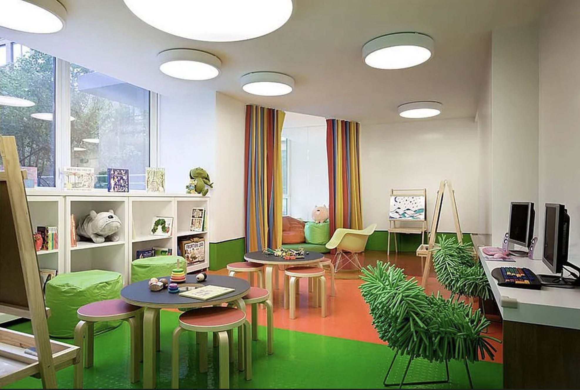 450 West 17th Street, Unit 1811 Manhattan, NY 10011 - Photo 11 of 14 a living room with furniture and a flat screen tv