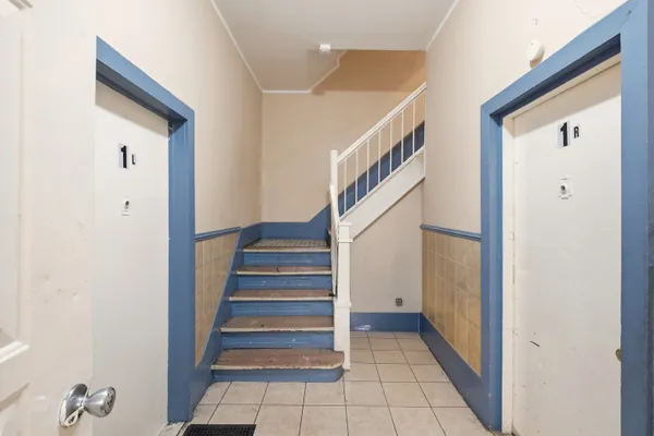 a view of an entryway with staircase