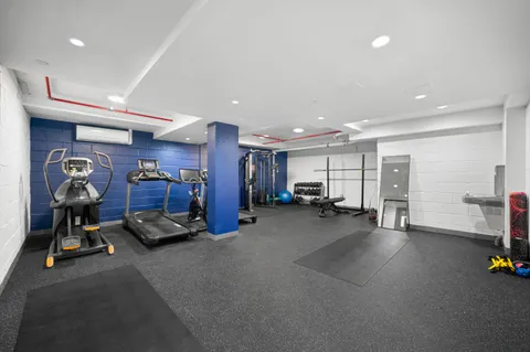 a view of a room with gym equipment