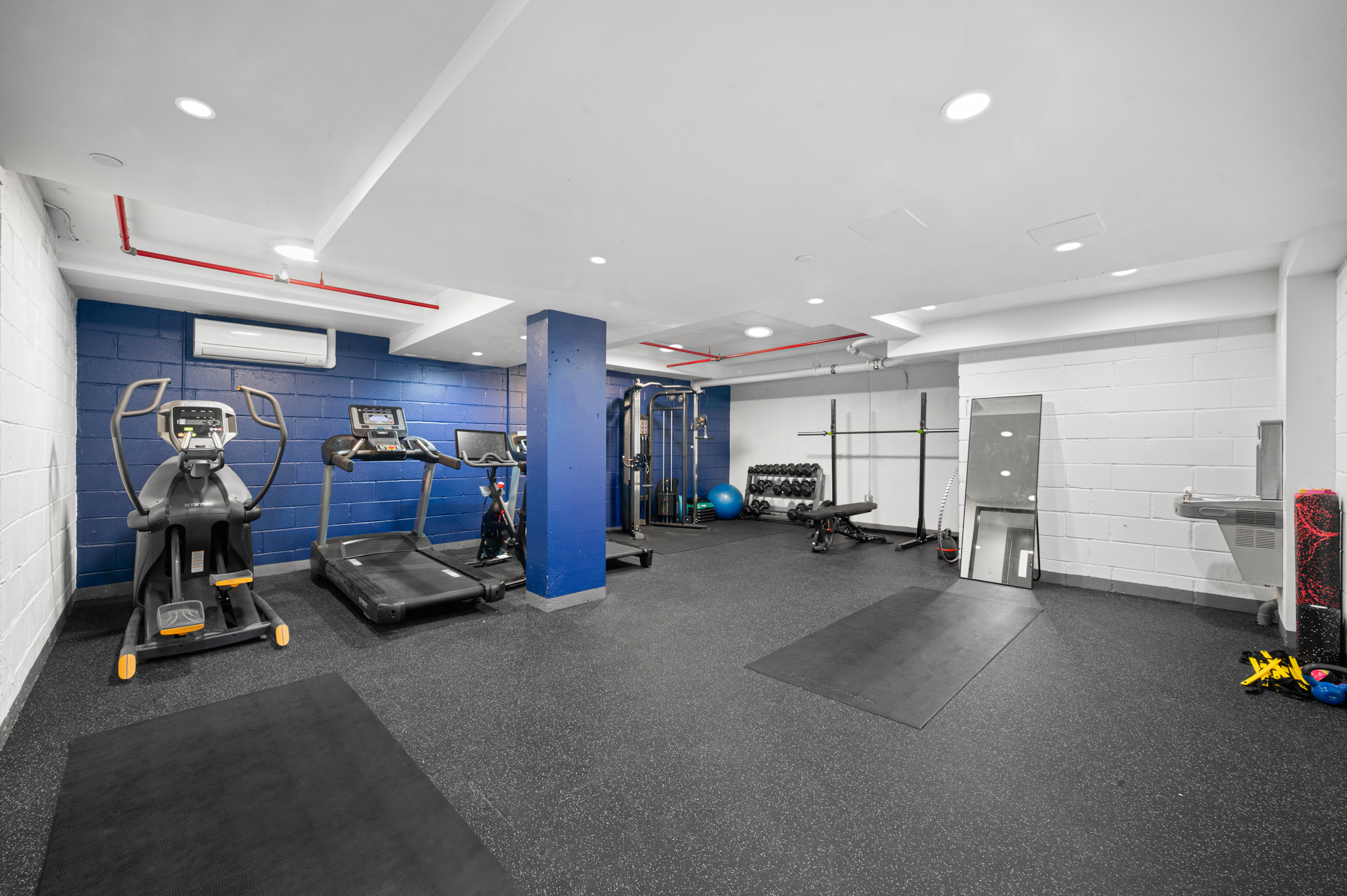 23-43 31st Road, Unit 3C Queens, NY 11106 - Photo 8 of 10 a view of a room with gym equipment