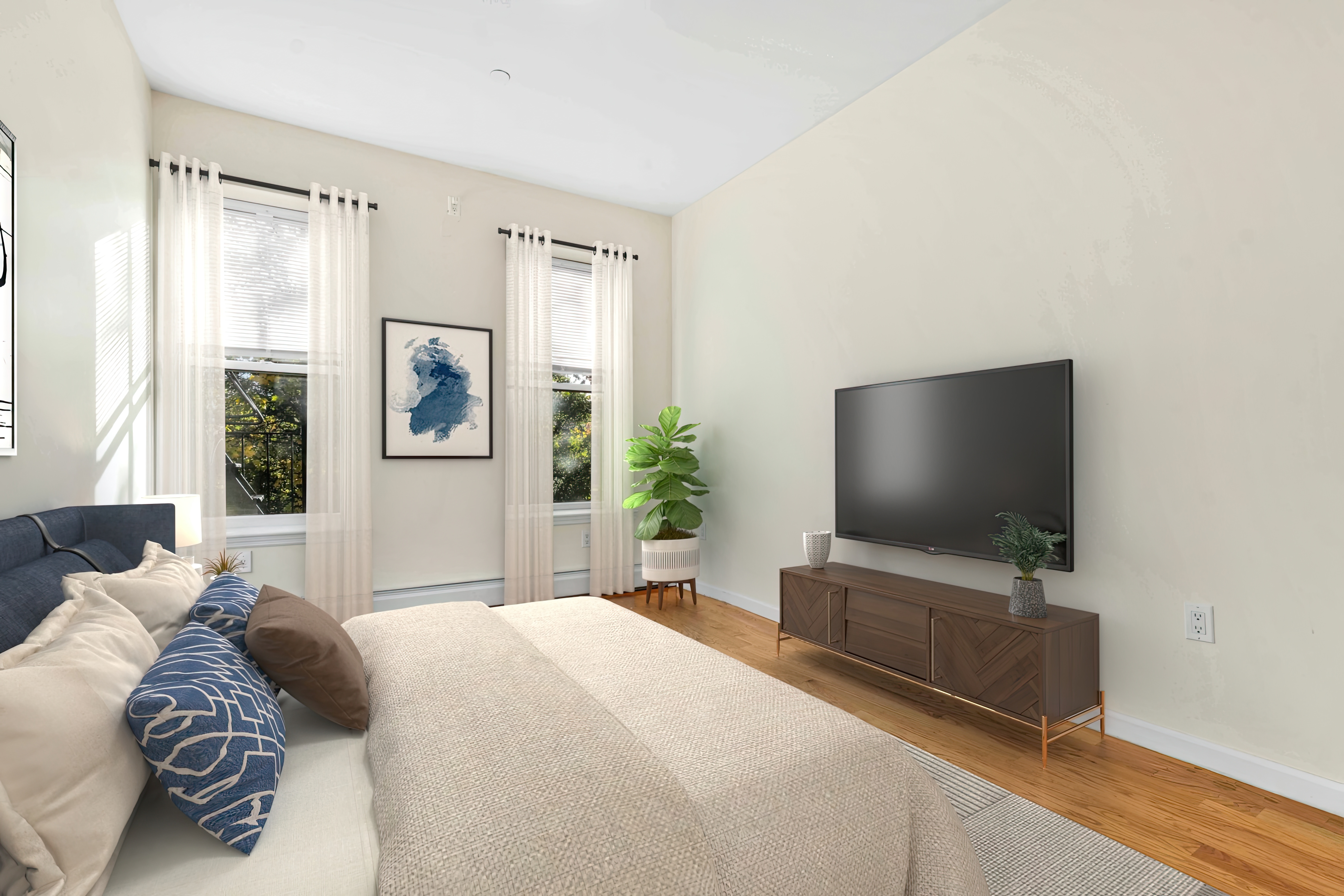 1892 Bergen Street, Unit 2 Brooklyn, NY 11233 - Photo 6 of 24 a bedroom with a bed and a flat screen tv