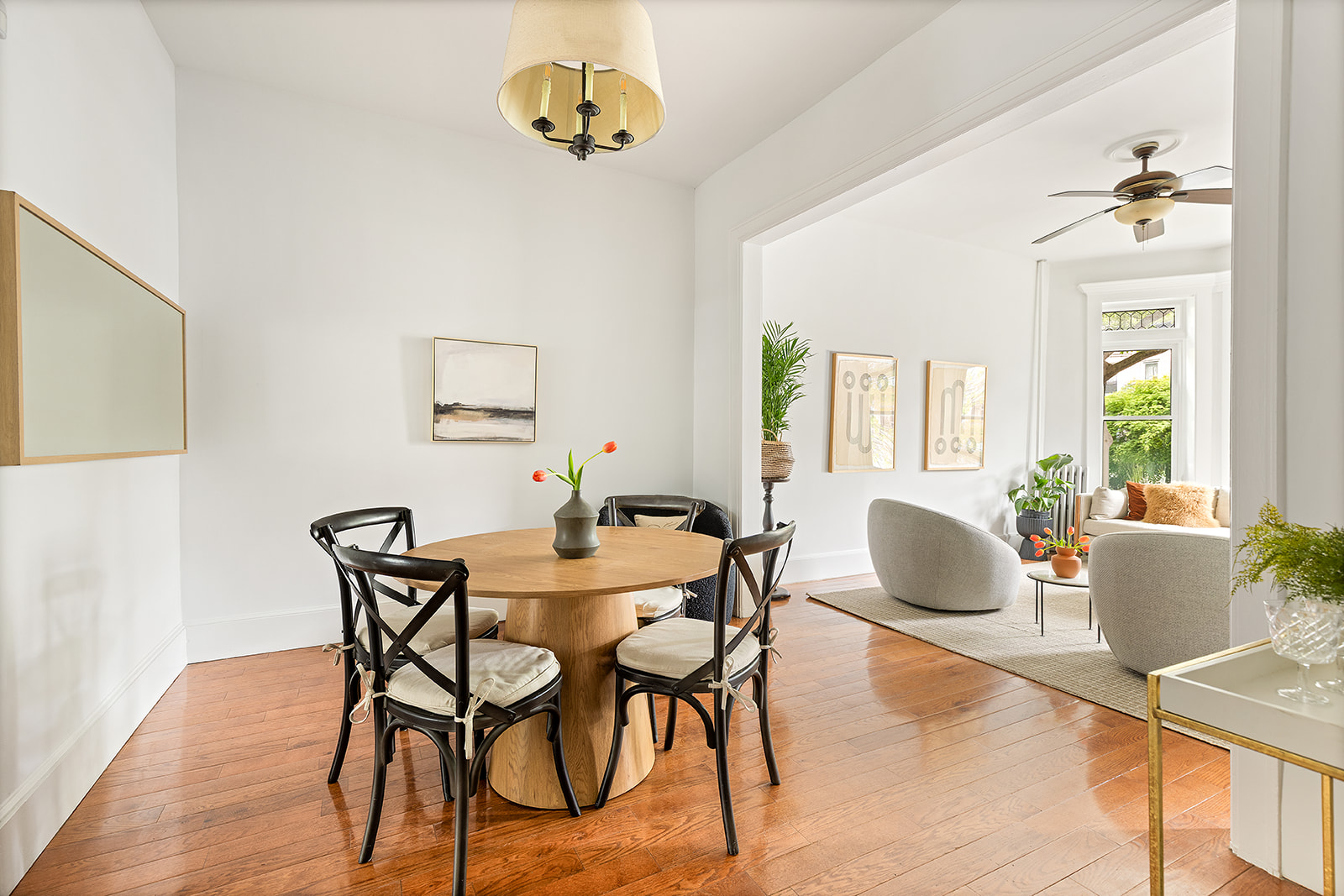 203 Lefferts Avenue Brooklyn, NY 11225 - Photo 5 of 12 a view of a dining room with furniture and wooden floor