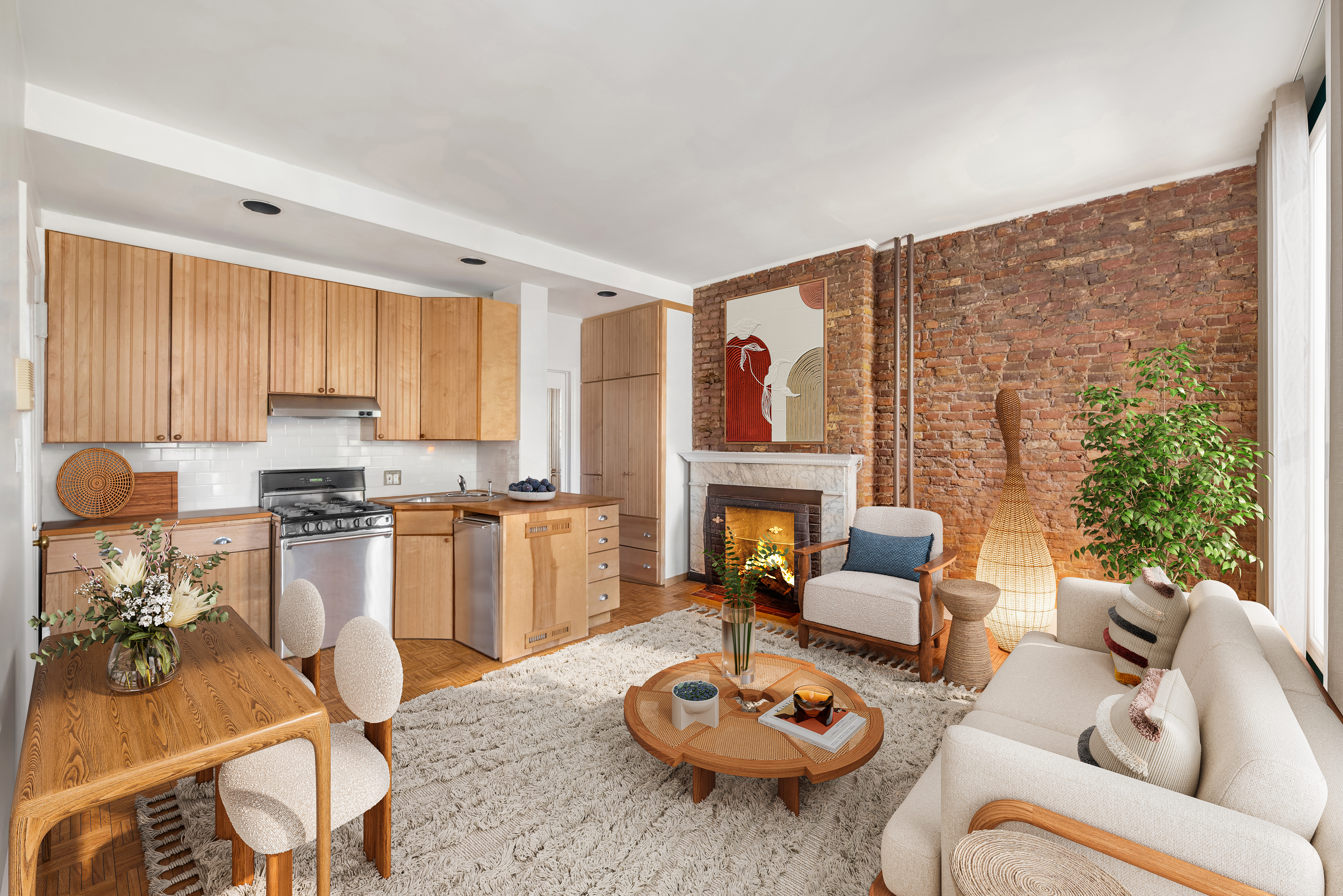 5 Charles Street, Unit 3R Manhattan, NY 10014 - Photo 5 of 14 a living room with furniture and a fireplace