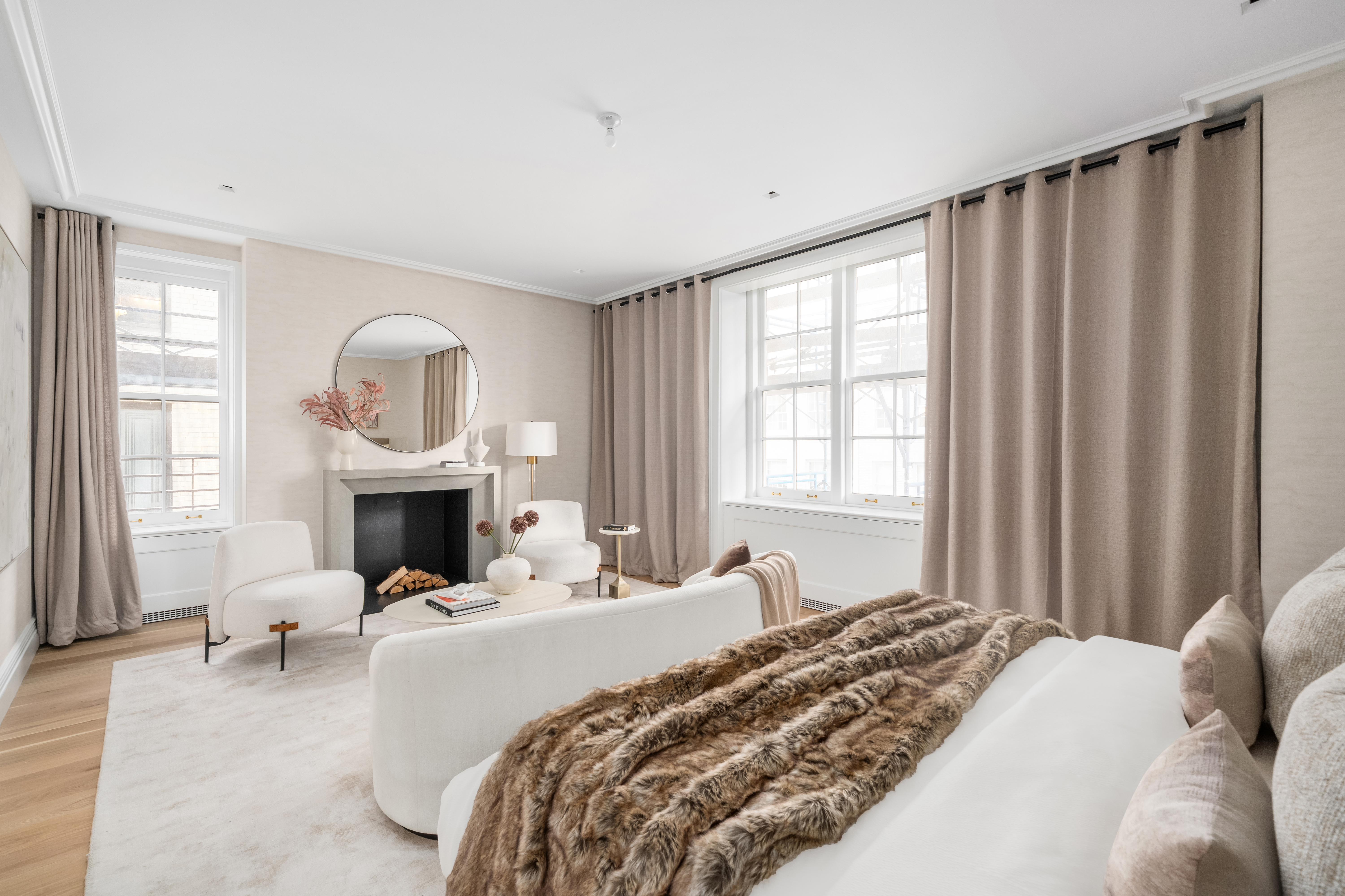 1020 5th Avenue, Unit 9 Manhattan, NY 10028 - Photo 15 of 27 a bedroom with a bed and a fireplace