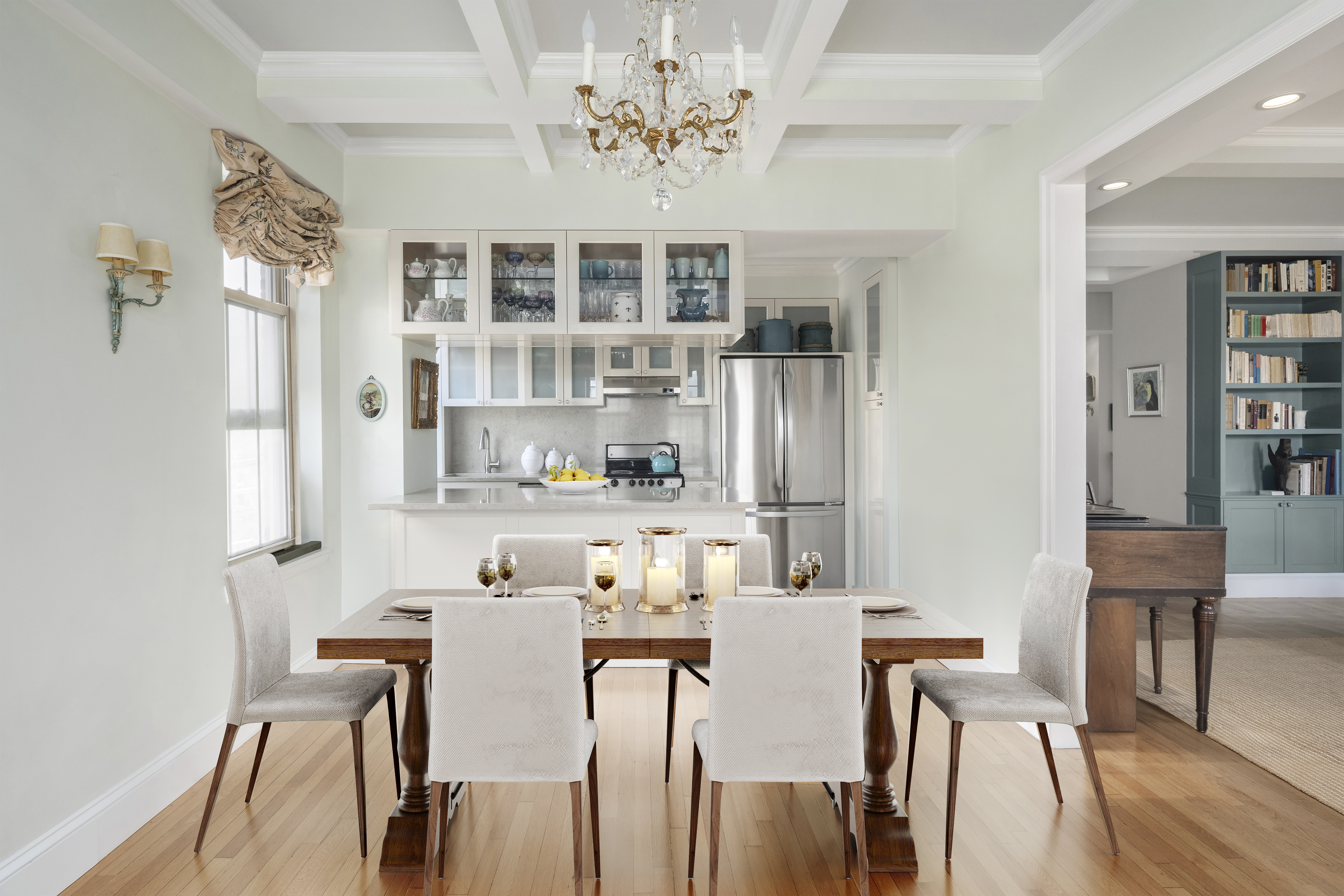 24 5th Avenue, Unit 801/802 Manhattan, NY 10011 - Photo 3 of 7 a view of a dining room with furniture and wooden floor