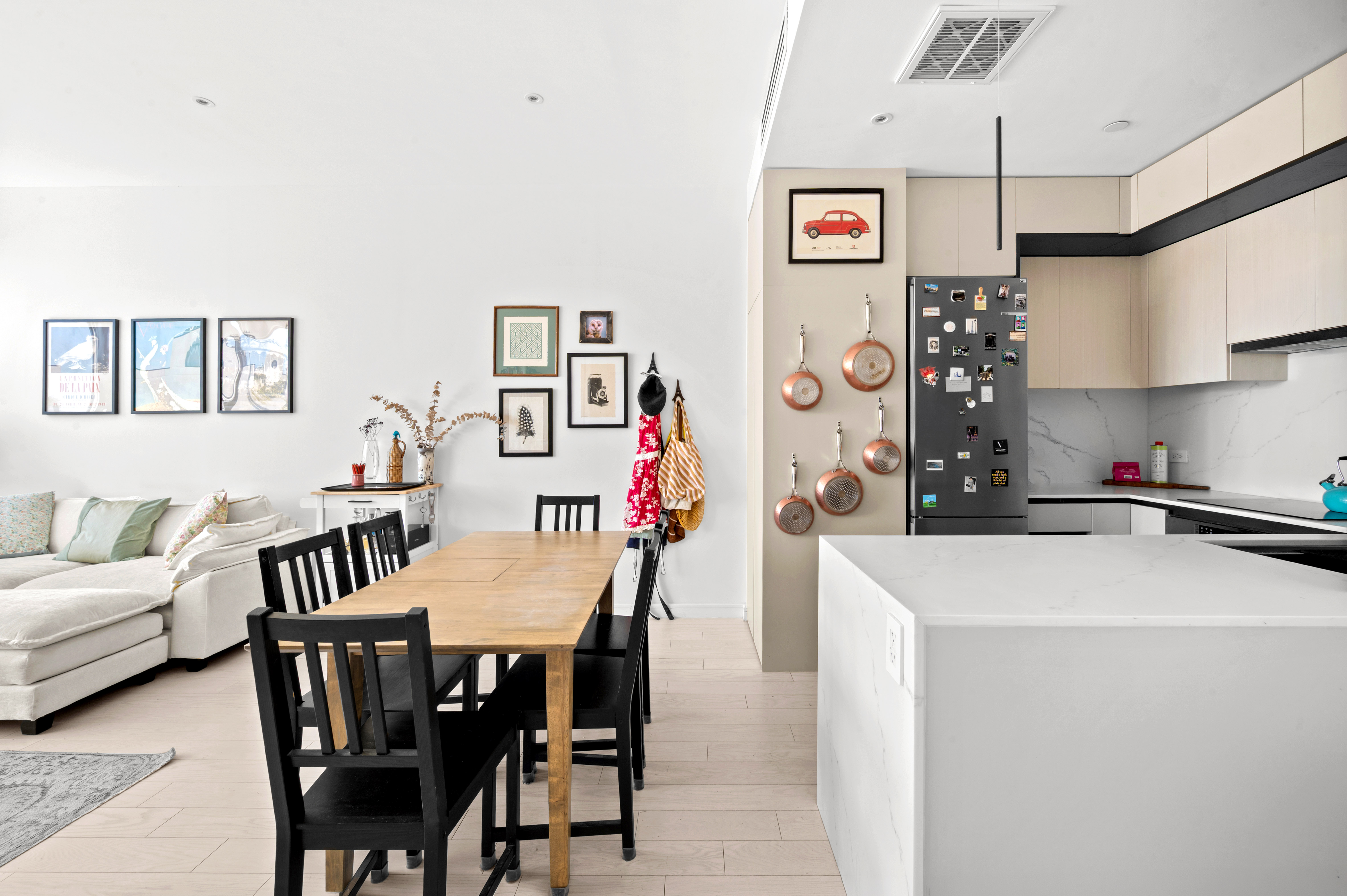 112 Cooper Street, Unit 4B Brooklyn, NY 11207 - Photo 5 of 17 a view of kitchen and dining room with furniture