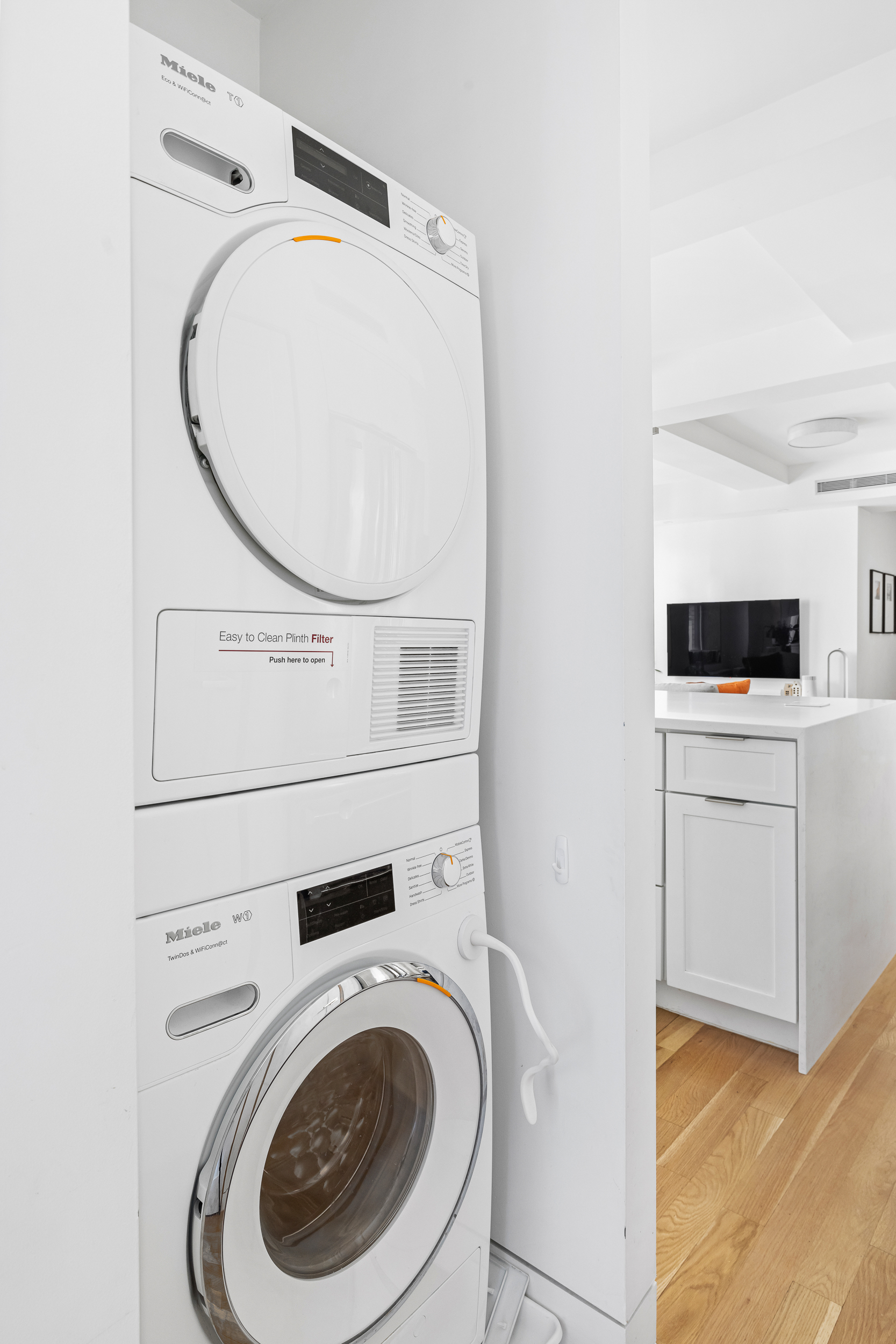 240 West 98th Street, Unit 8D Manhattan, NY 10025 - Photo 11 of 12 a utility room with dryer and washer