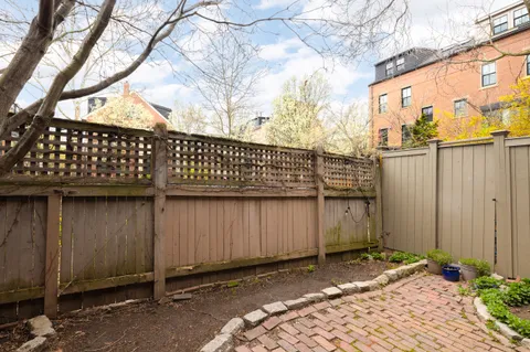 a view of a wooden fence