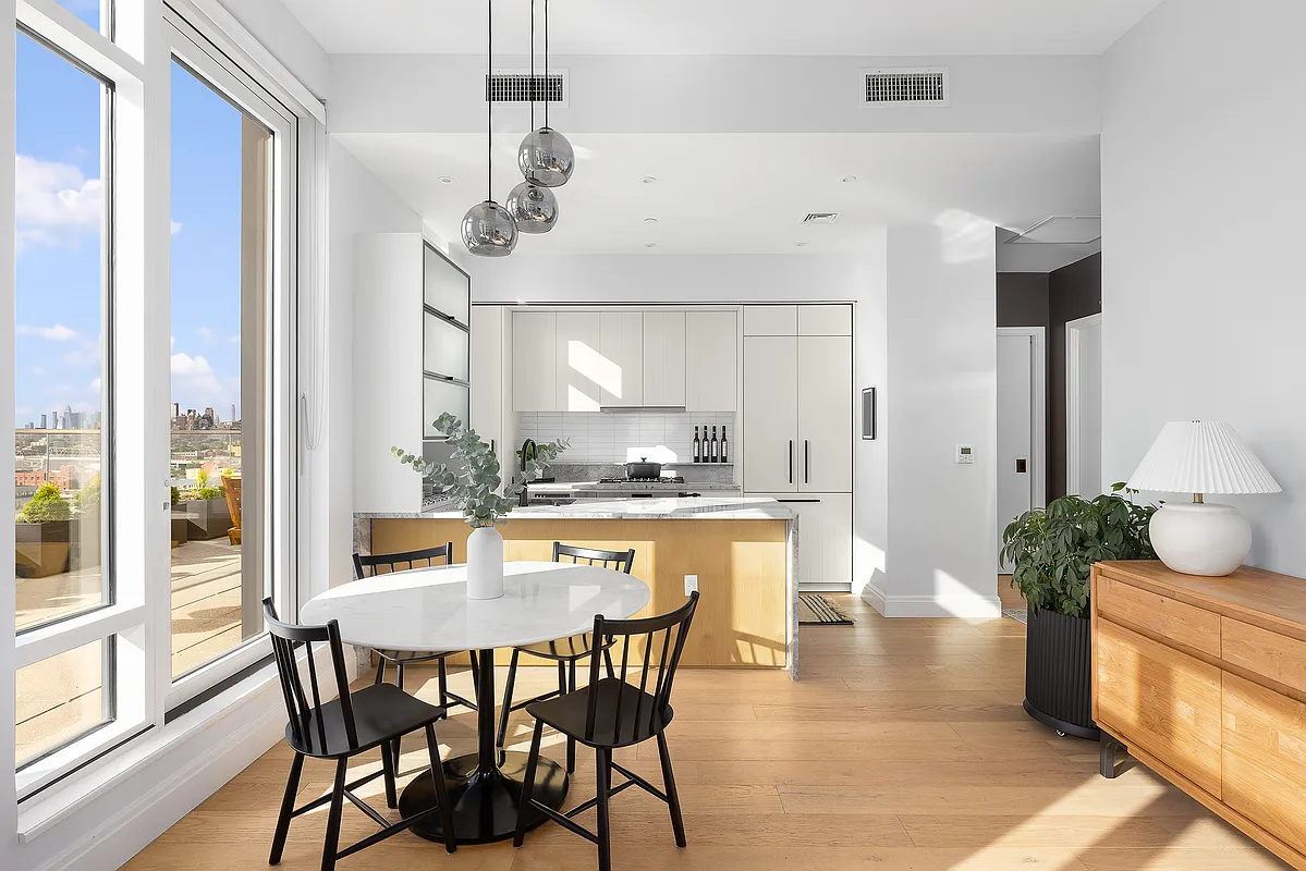 181 18th Street, Unit 1002 Brooklyn, NY 11215 - Photo 3 of 19 a dining room with furniture and window