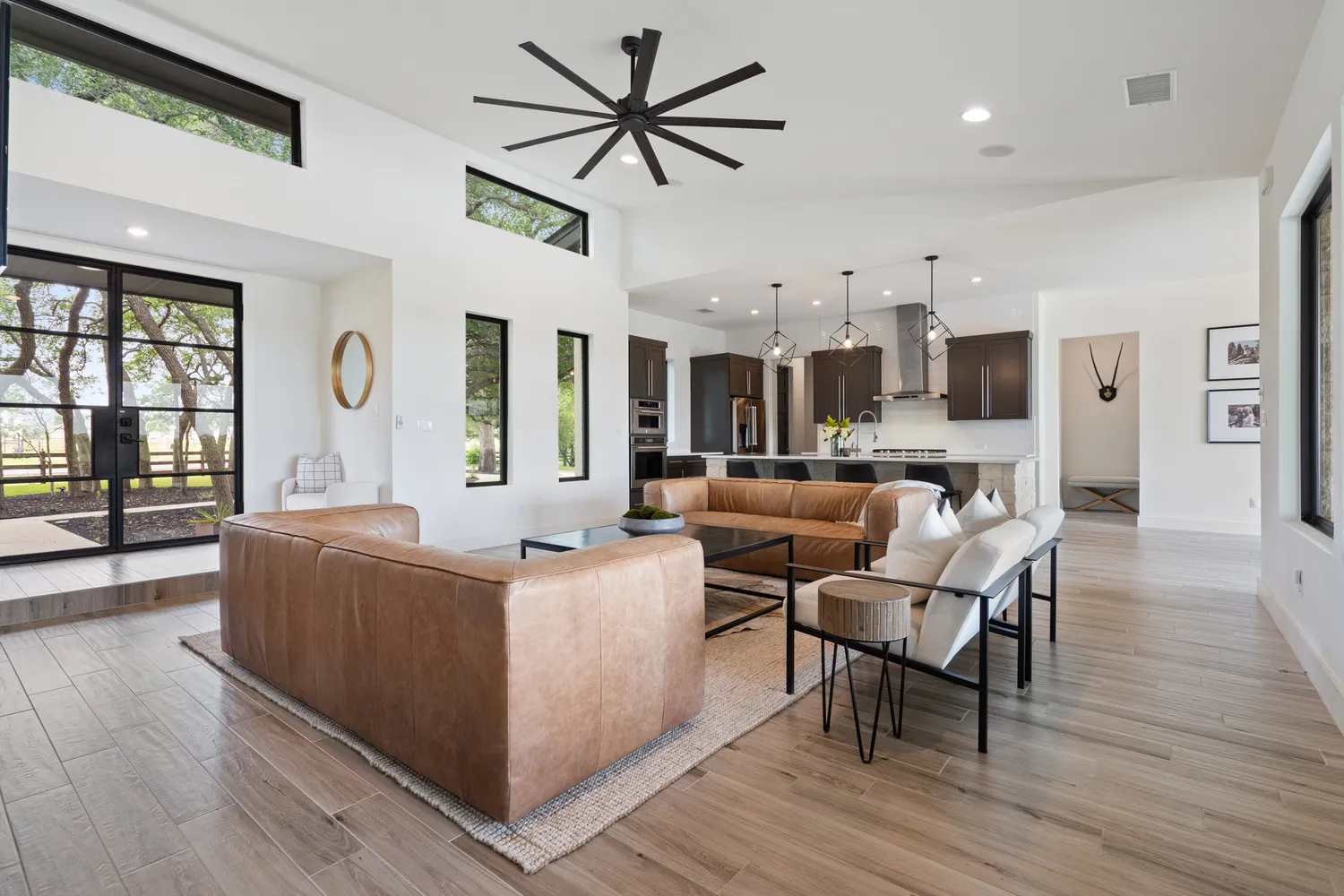 a kitchen with a sink and a stove top oven