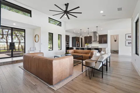 a kitchen with a sink and a stove top oven