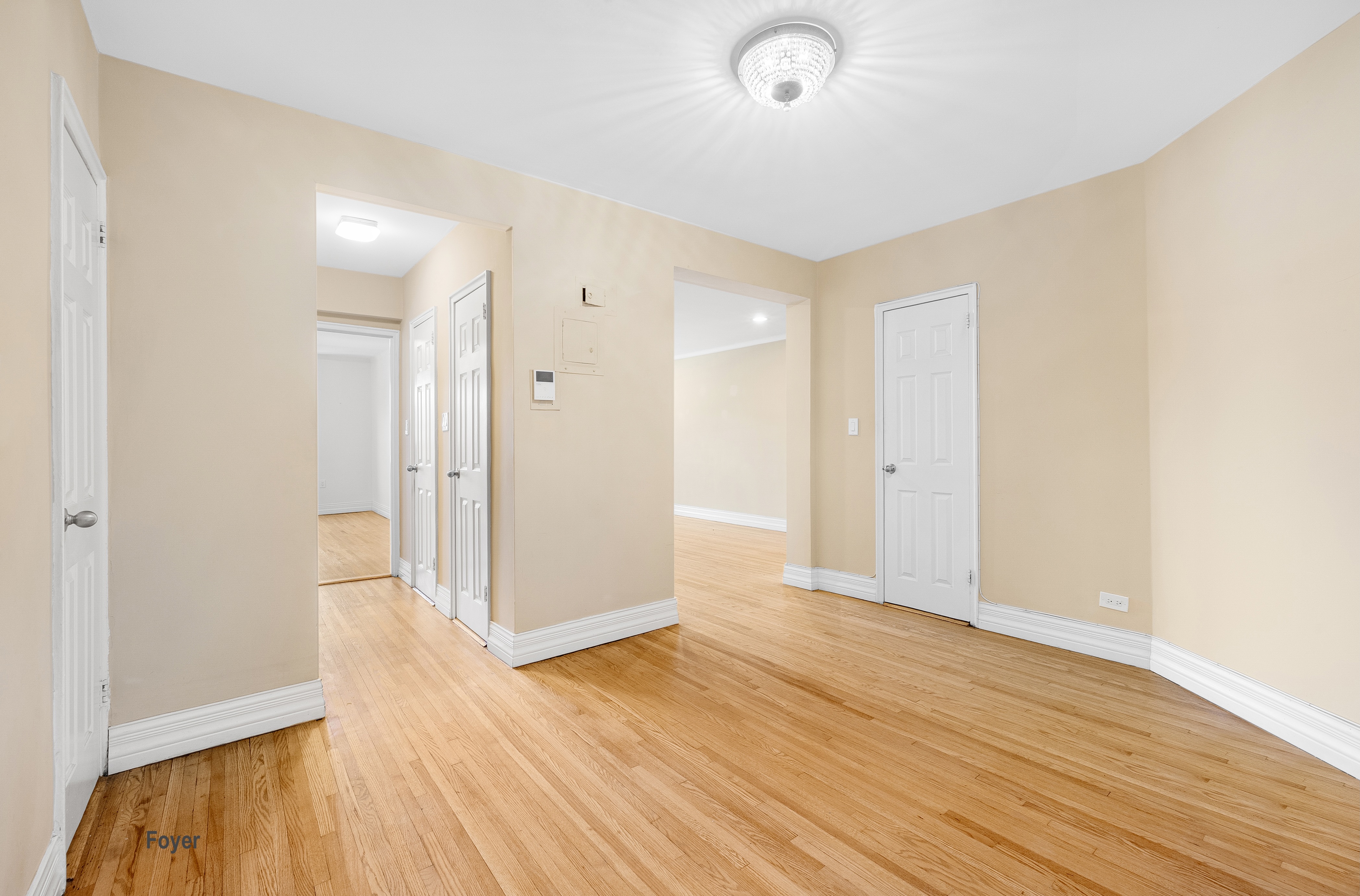 34-41 85th Street, Unit 4R Queens, NY 11372 - Photo 4 of 19 a view of an empty room with wooden floor