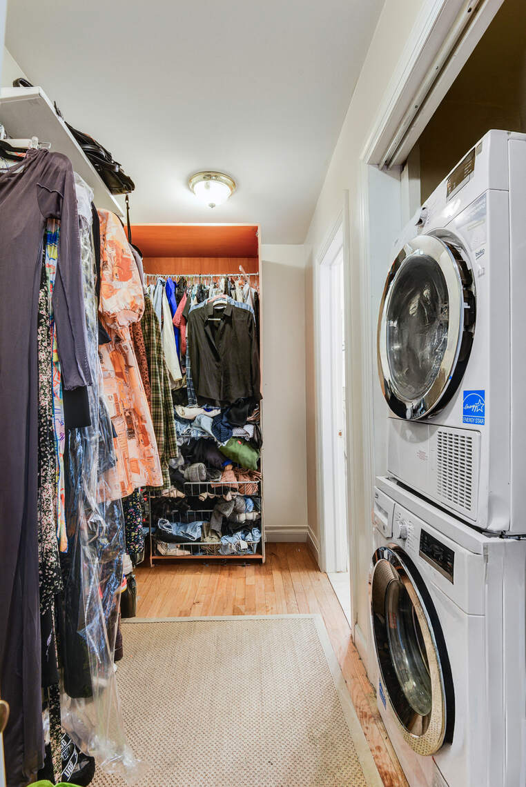 585 Warren Street, Unit 2 Brooklyn, NY 11217 - Photo 5 of 12 a view of a storage and utility room with a washer and dryer