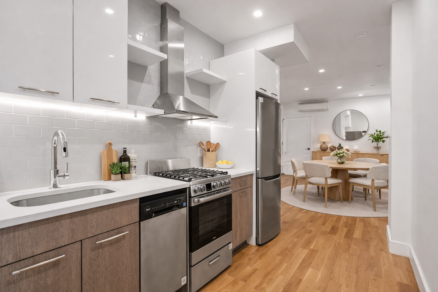 911 Nostrand Avenue, Unit 1R Brooklyn, NY 11225 - Photo 4 of 13 a kitchen with a stove cabinets and wooden floor