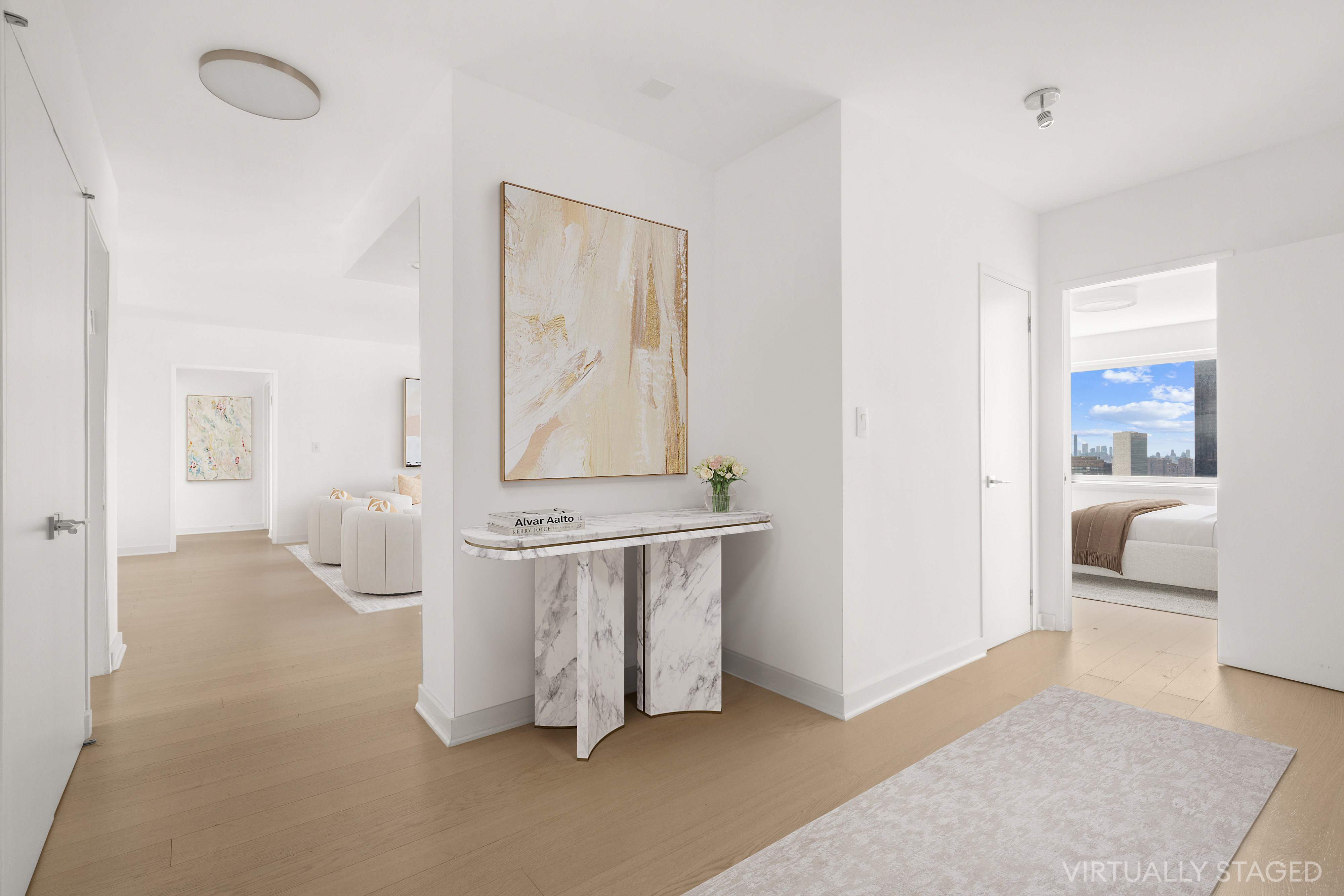 303 East 57th Street, Unit 41G Manhattan, NY 10022 - Photo 14 of 15 a living room with furniture a flat screen tv and a table