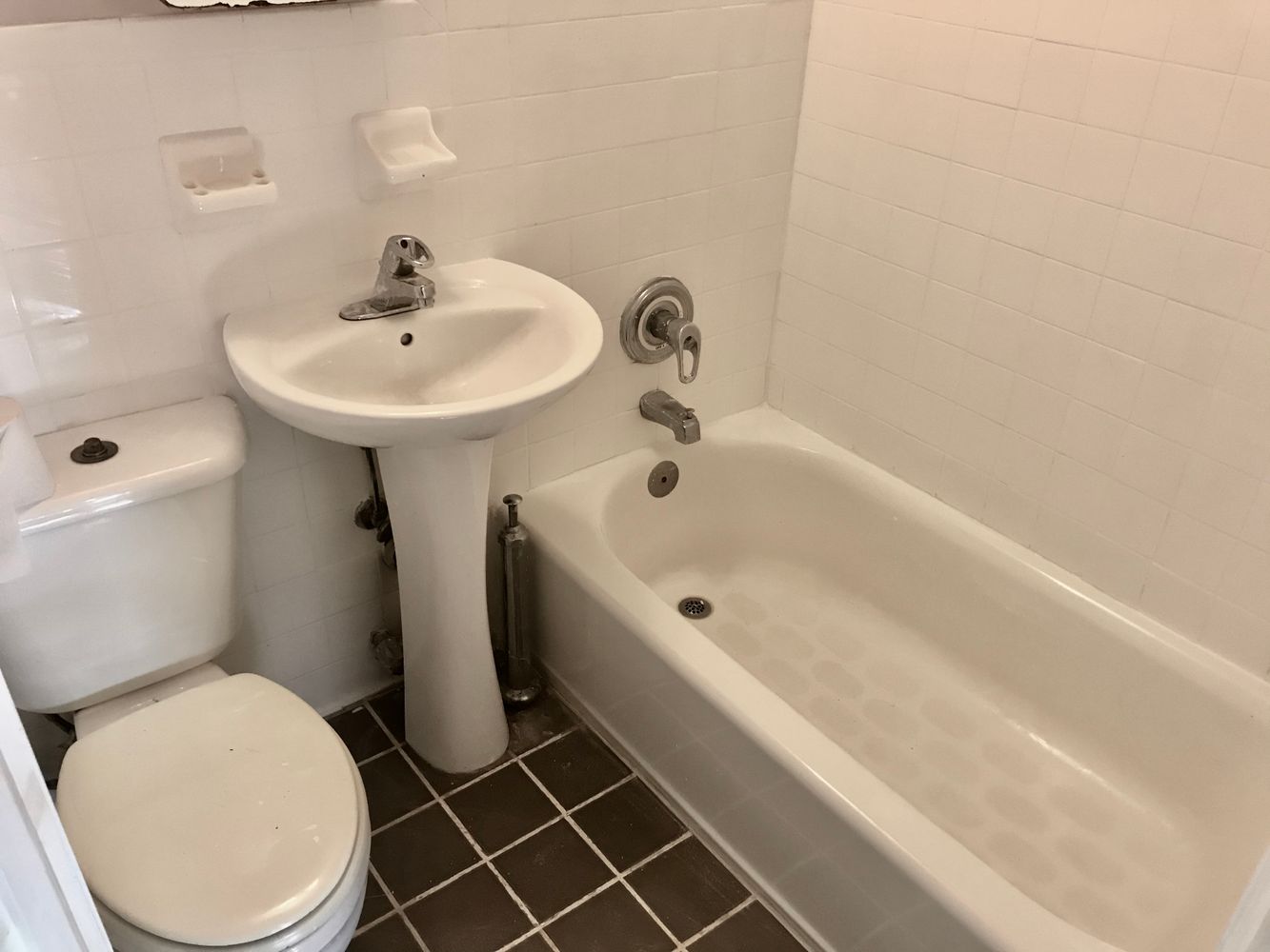 1672 Park Avenue Manhattan, NY 10035 - Photo 20 of 35 a bathroom with a sink a toilet and shower