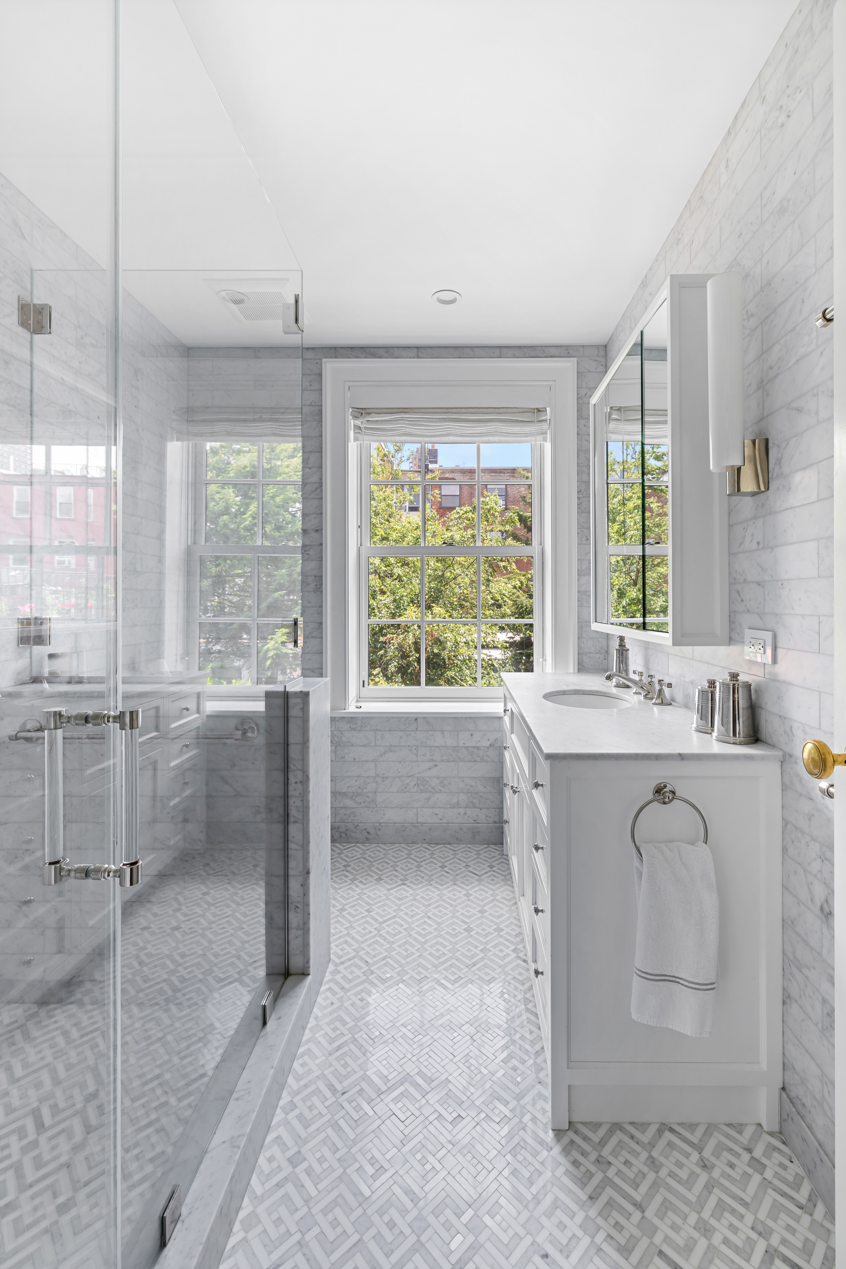 13 Garden Place, Unit B Brooklyn, NY 11201 - Photo 8 of 22 a bathroom with a granite countertop sink mirror and window