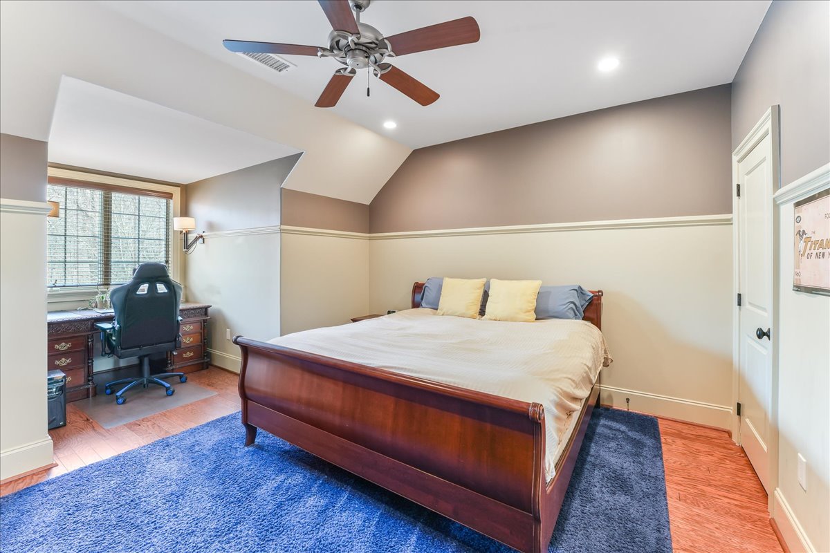 248 Valley Ridge Road Haverford, PA 19041 - Photo 26 of 44 a bed room with a bed and a chandelier