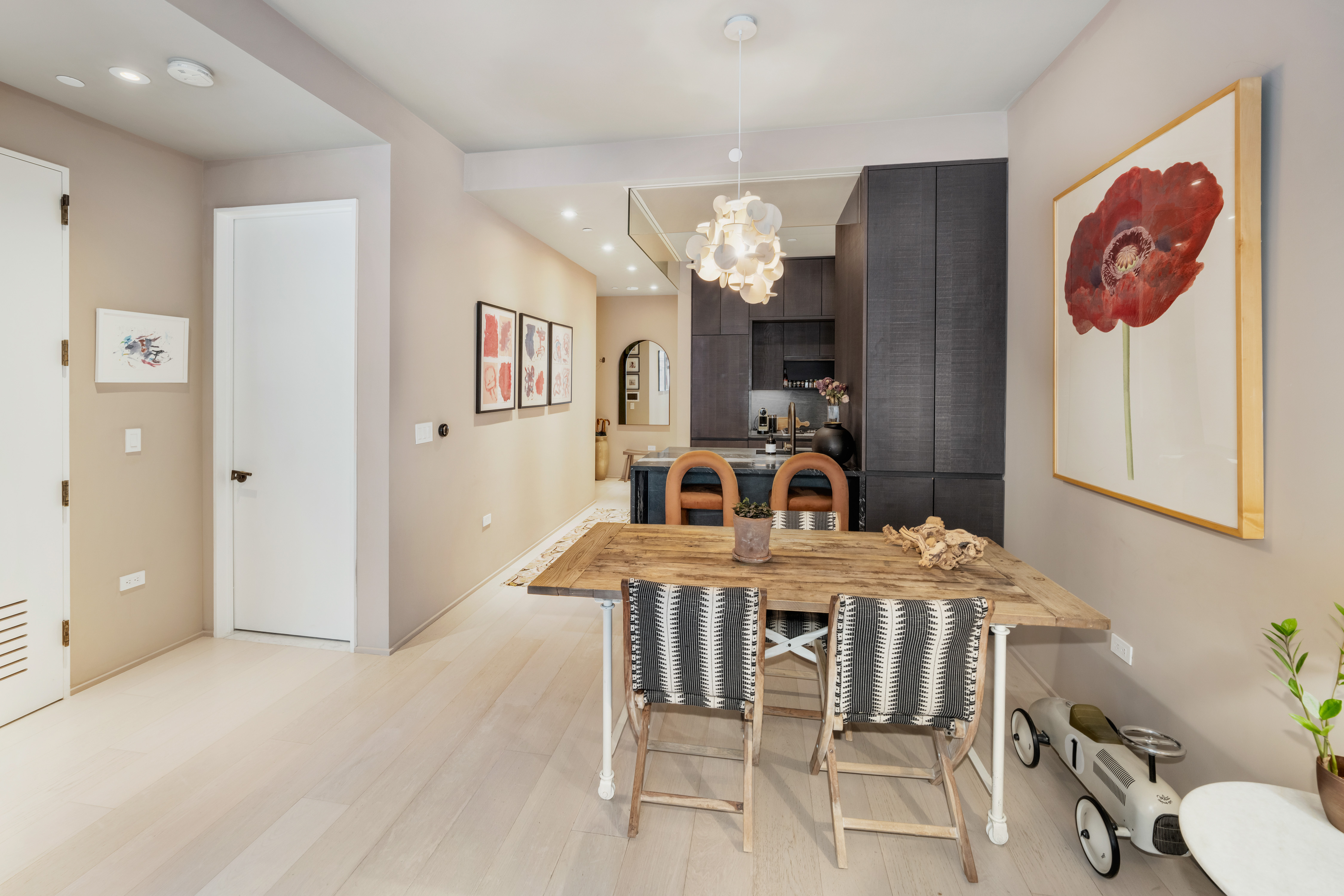 130 William Street, Unit 21A Manhattan, NY 10038 - Photo 2 of 13 a view of a dining room with furniture