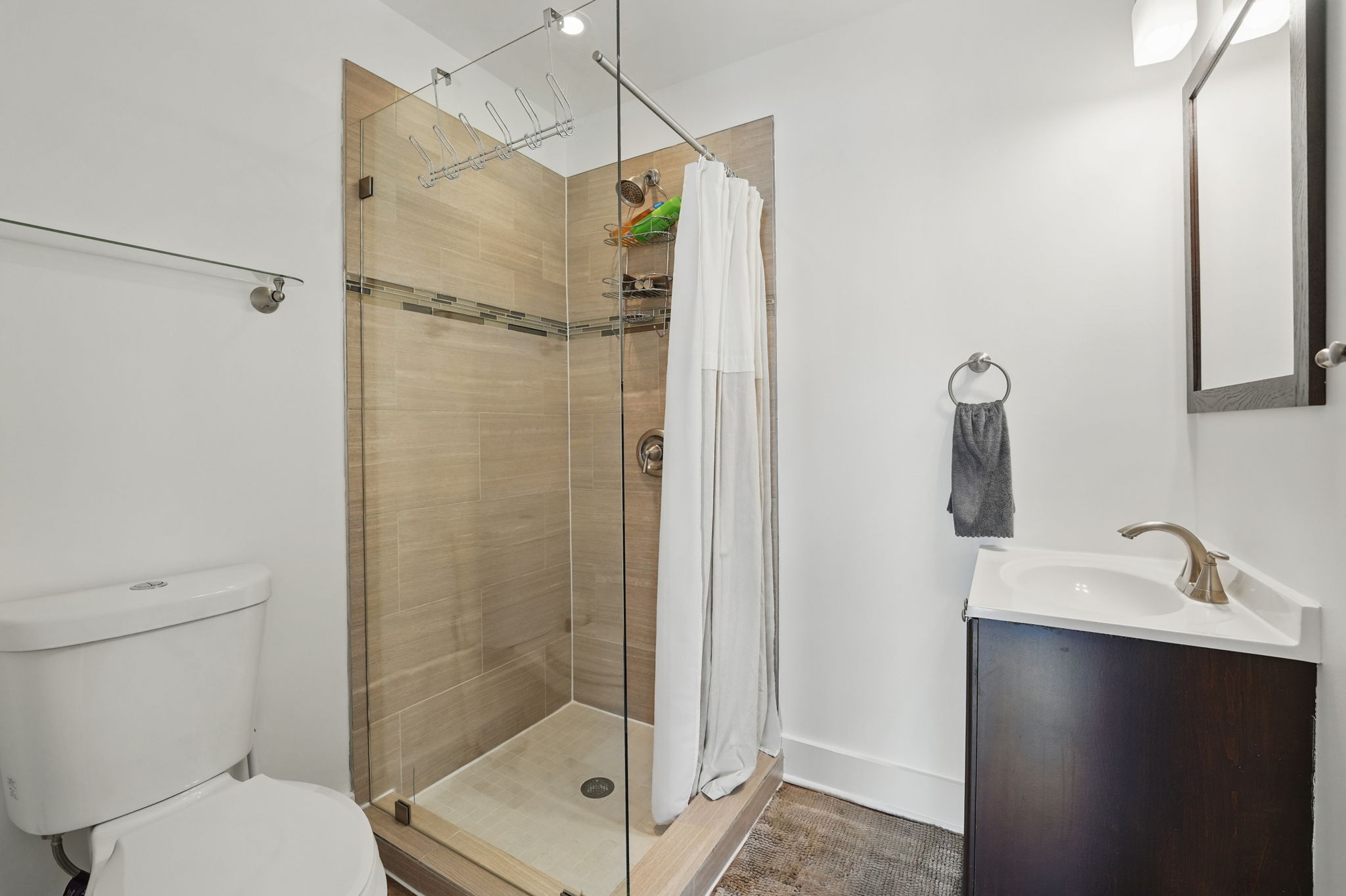 28 Q Street Northeast, Unit 2 Washington, DC 20002 - Photo 33 of 41 a bathroom with a shower and a toilet