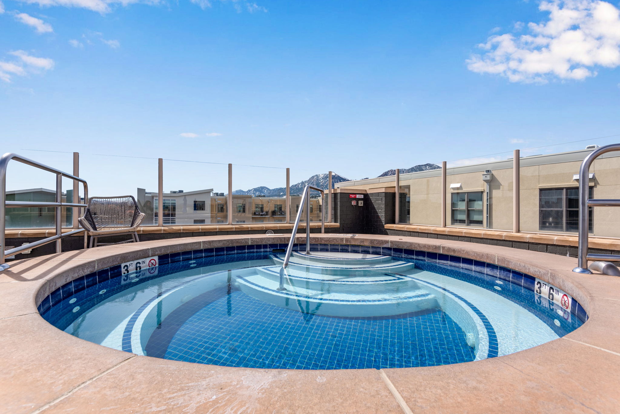 3401 Arapahoe Avenue, Unit Undisclosed Boulder, CO 80303 - Photo 26 of 28 a view of a swimming pool with a chair