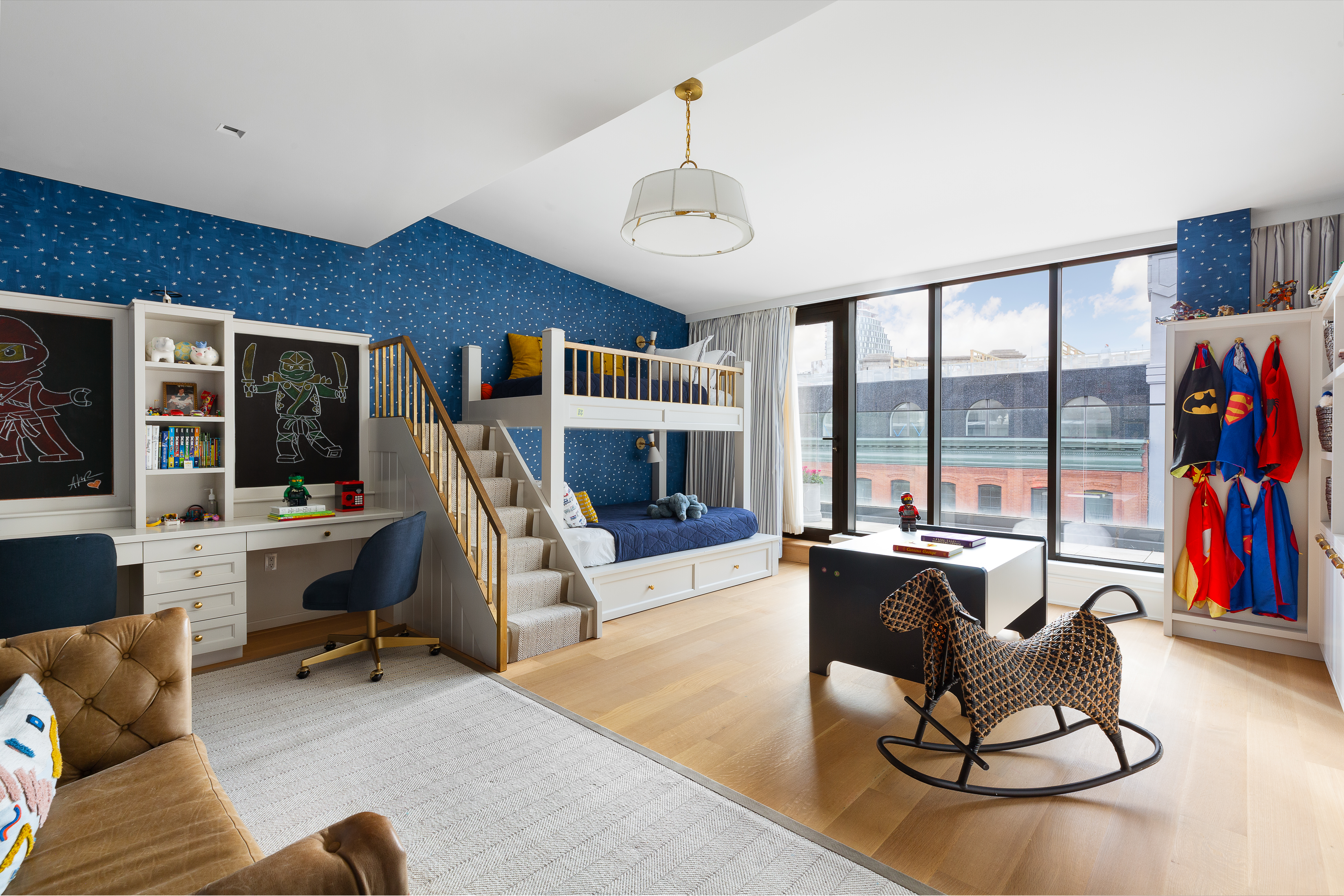 51 Jay Street, Unit PHB Brooklyn, NY 11201 - Photo 17 of 21 a living room with furniture fireplace and a large window
