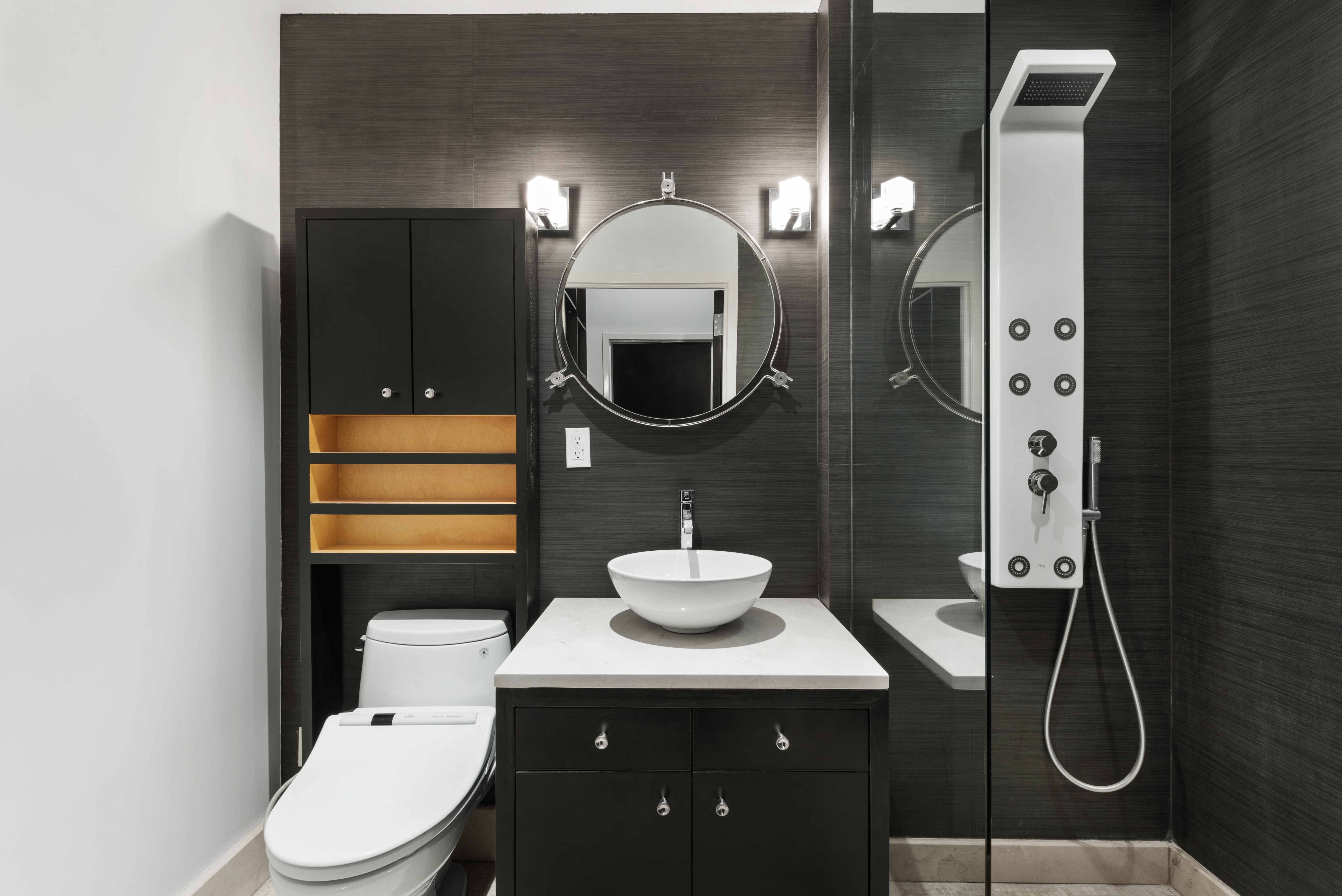 175 Franklin Street, Unit LOFT Manhattan, NY 10013 - Photo 7 of 12 a bathroom with a toilet sink and mirror