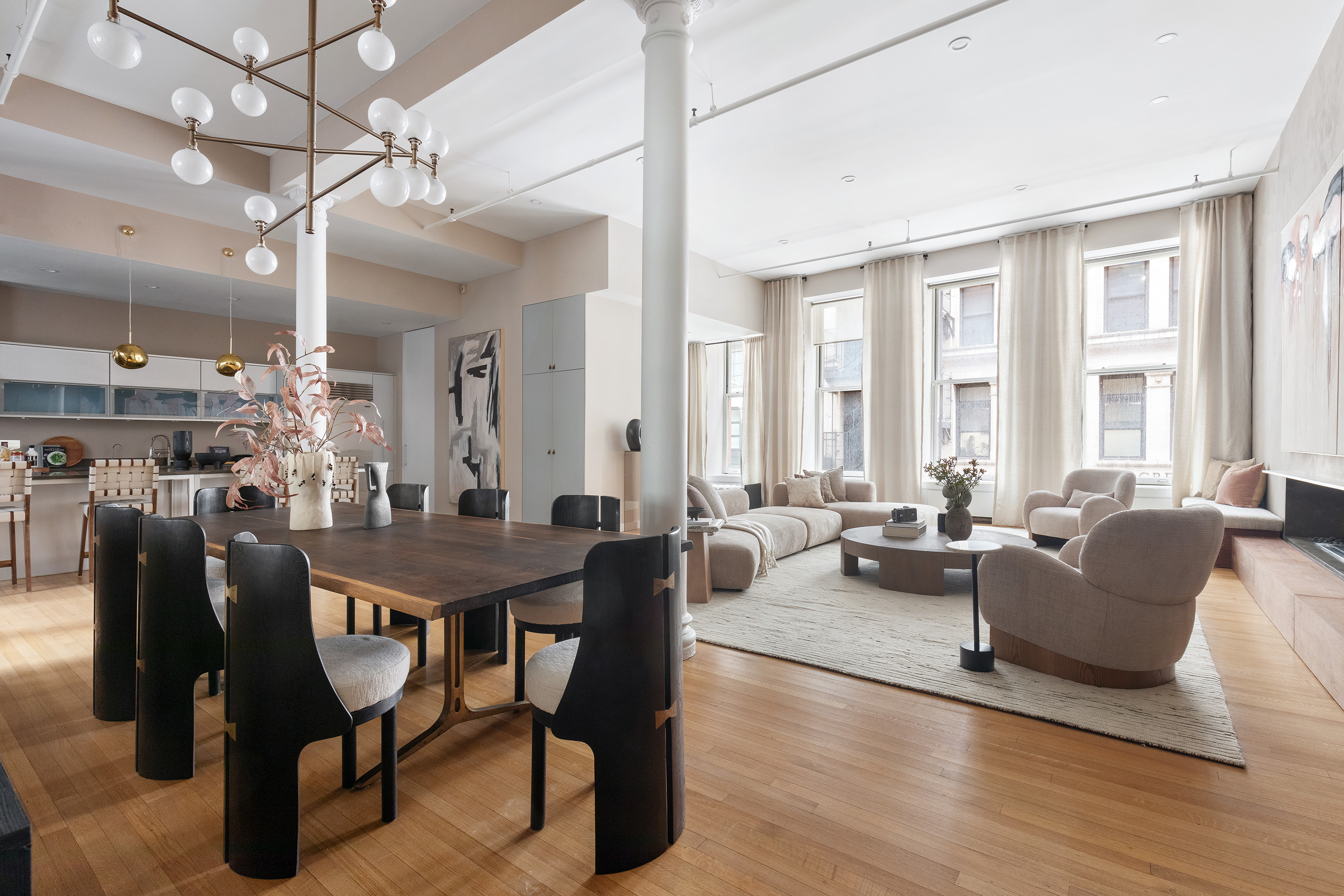 76 Crosby Street, Unit 2A Manhattan, NY 10012 - Photo 4 of 12 a view of a dining room with furniture window and wooden floor