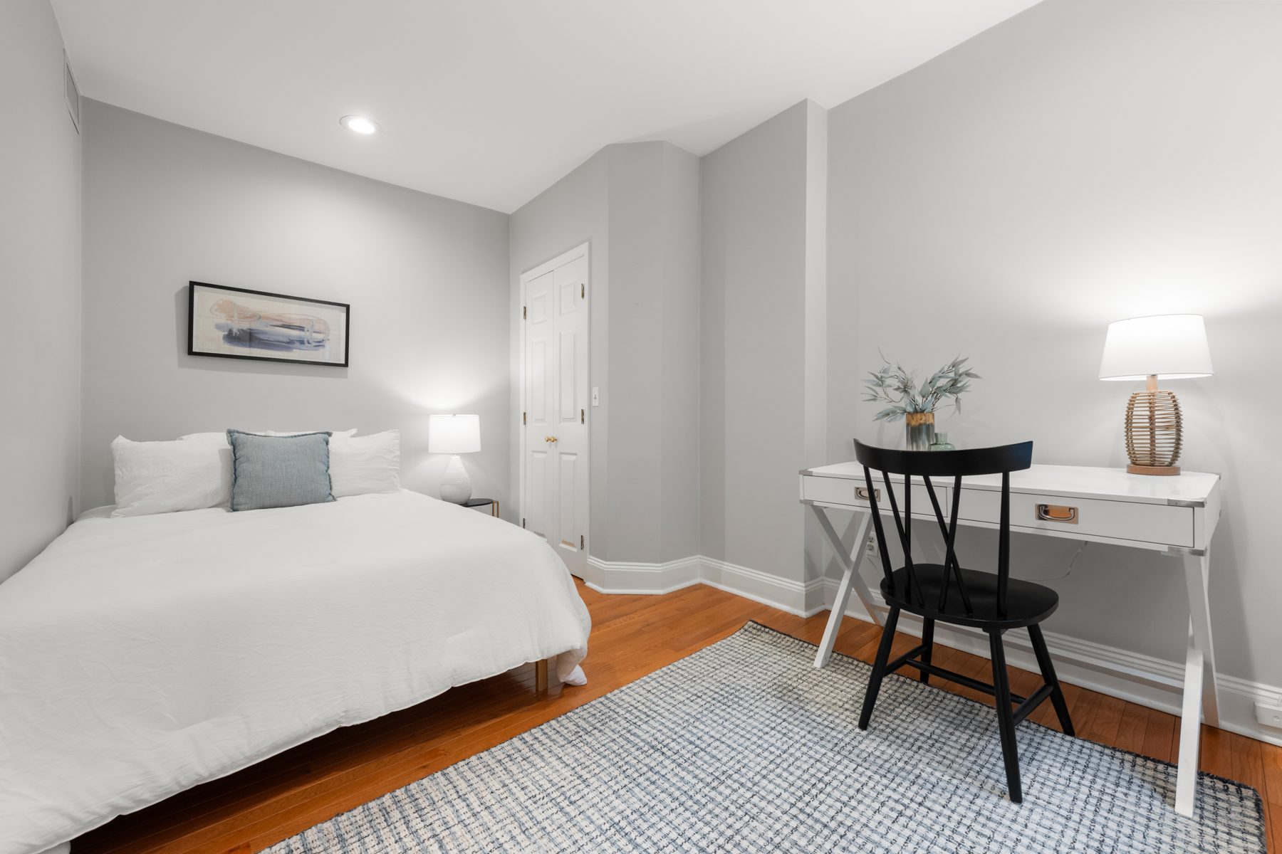 63 West Cedar Street, Unit 3 Boston, MA 02114 - Photo 9 of 17 a bedroom with a bed and a table