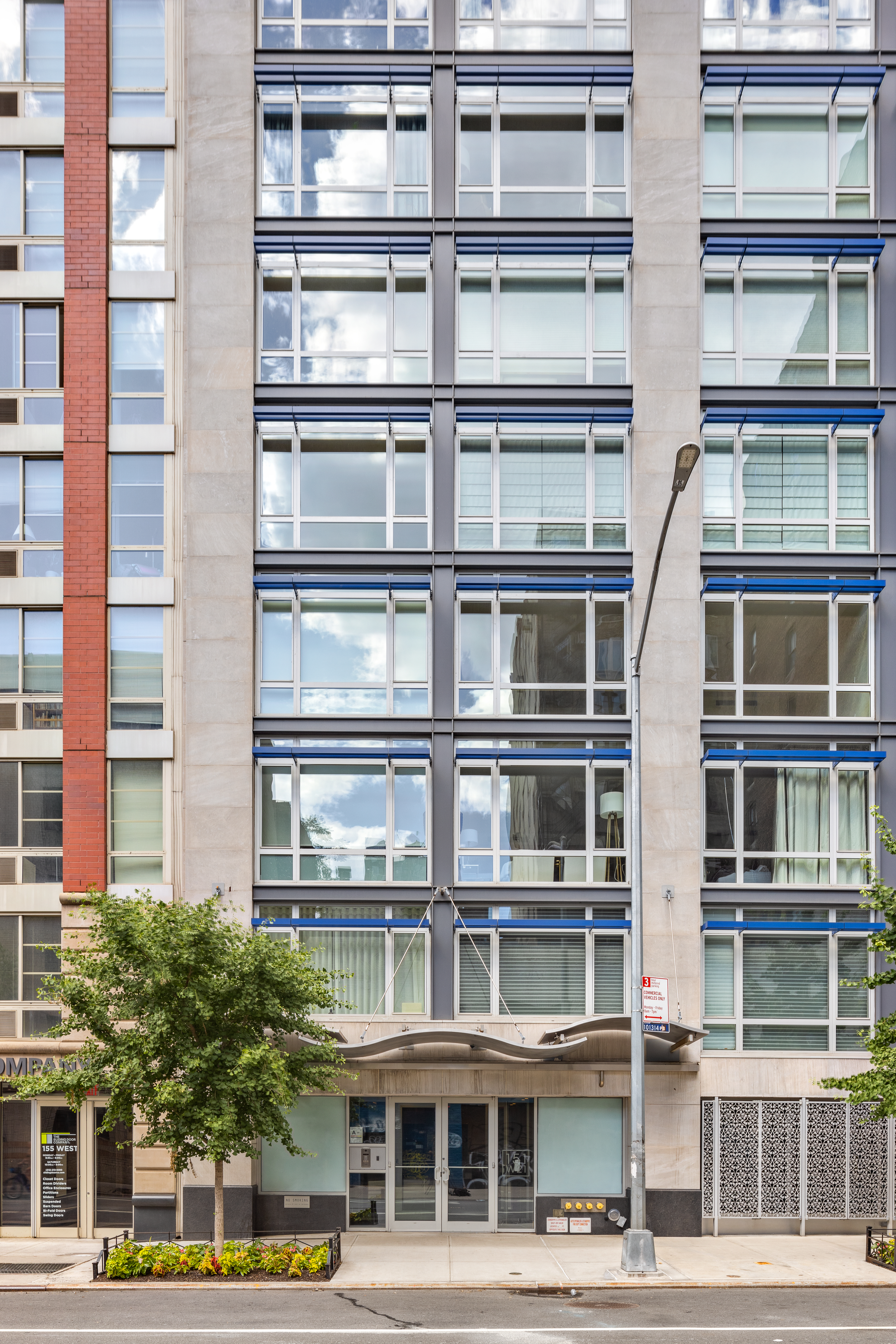 151 West 21st Street, Unit 9C Manhattan, NY 10011 - Photo 9 of 10 a front view of a multi story building