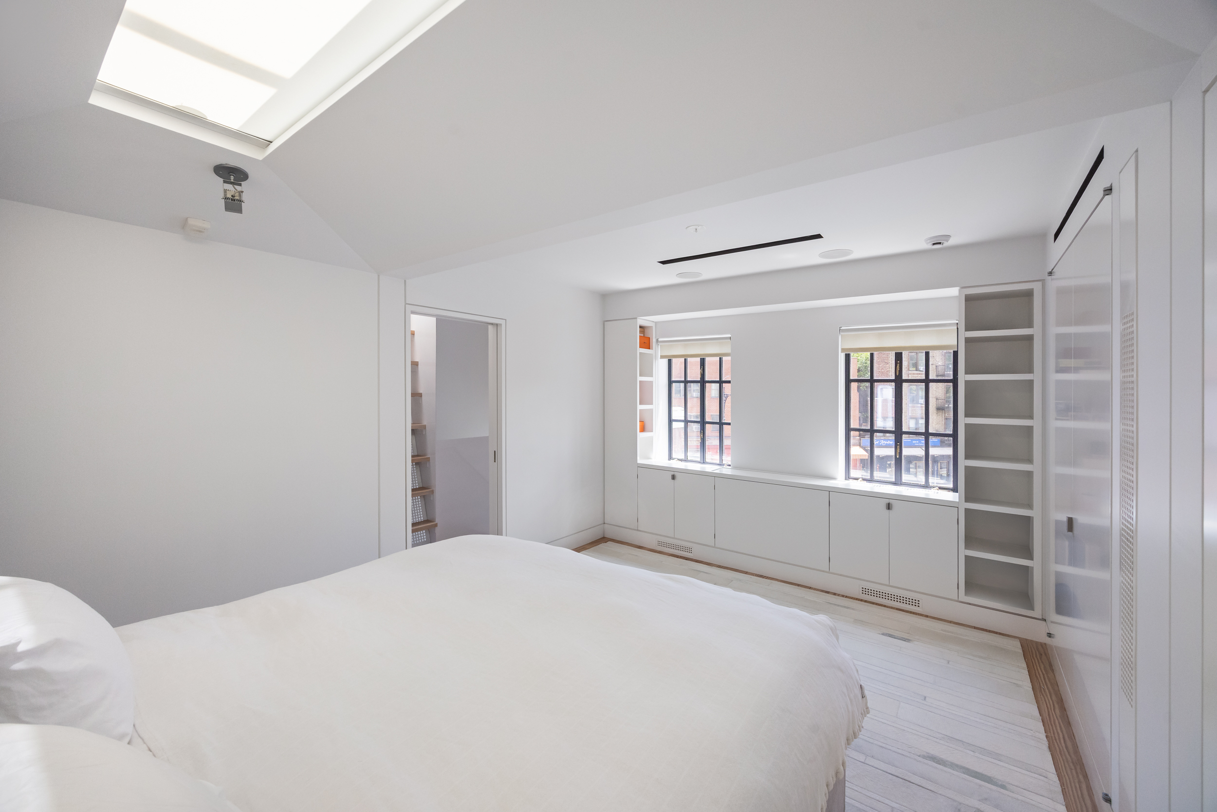 39 Barrow Street Manhattan, NY 10014 - Photo 30 of 39 a bedroom with a bed and a window